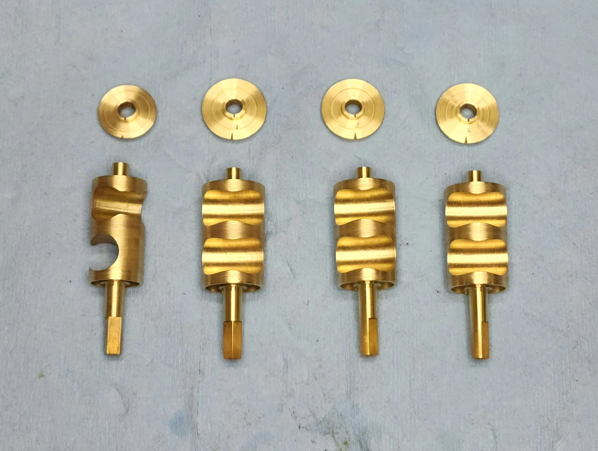 A set of brass french horn rotors cleaned and ready for electroplating