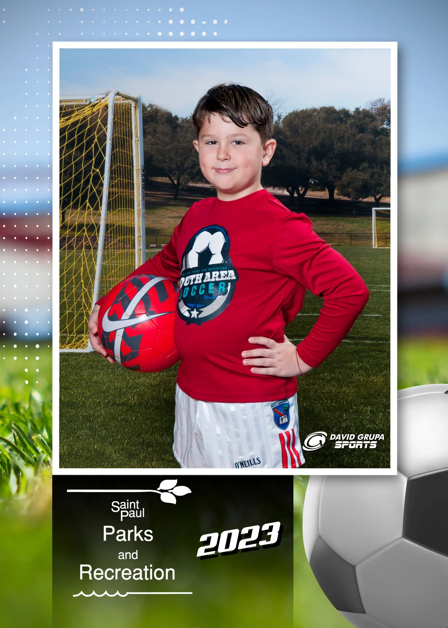 A young boy in a red soccer jersey standing on a soccer field, holding a red and black soccer ball, with a soccer goal in the background. The photo is part of a report or brochure for Saint Paul Parks and Recreation 2023.