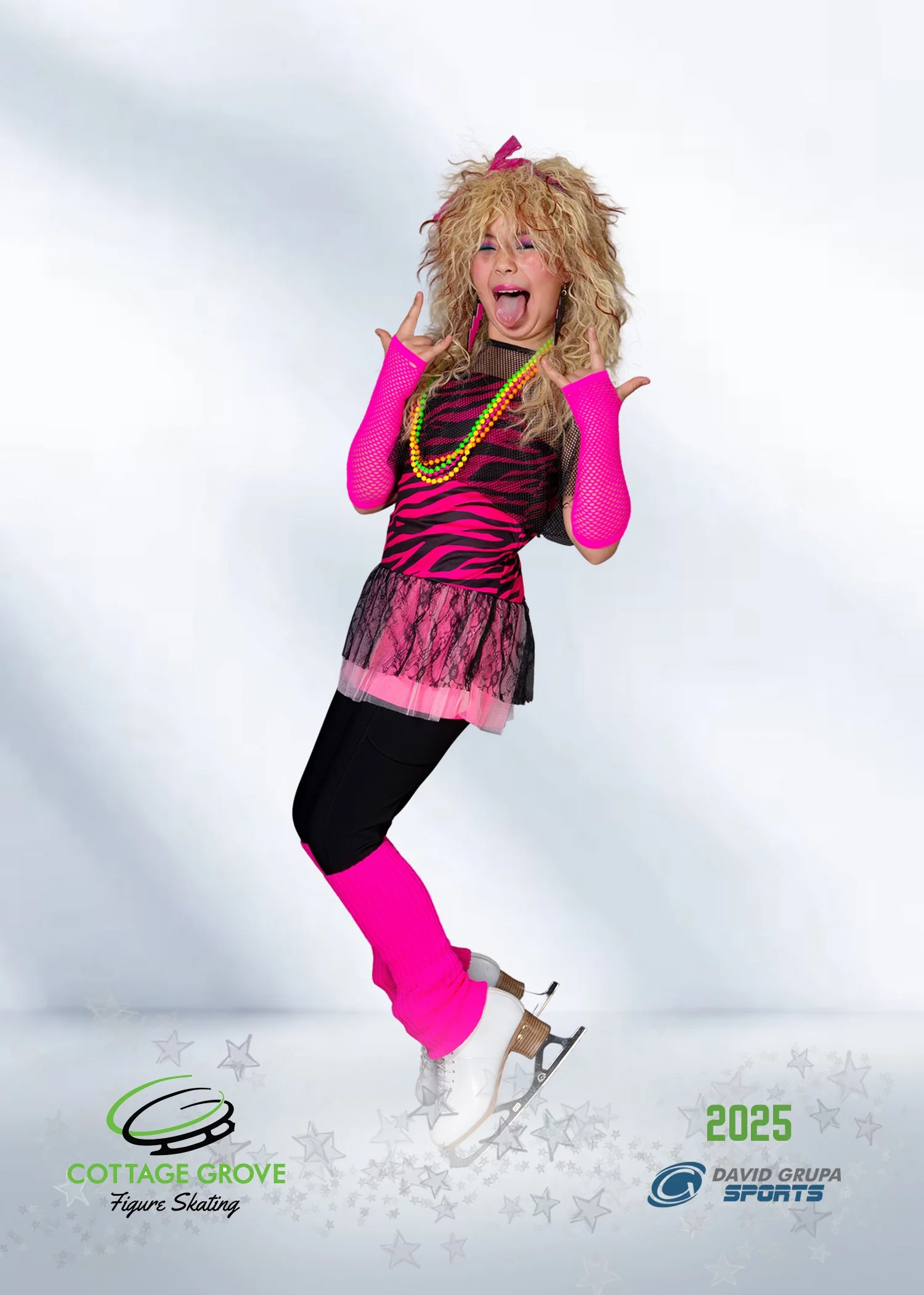 A person dressed in colorful 80s style outfit,ice skating, wearing pink leg warmers, black leggings, pink fishnet arm warmers, and a pink and black zebra-patterned top with lace trim, making a fun face with tongue out and hands near face.