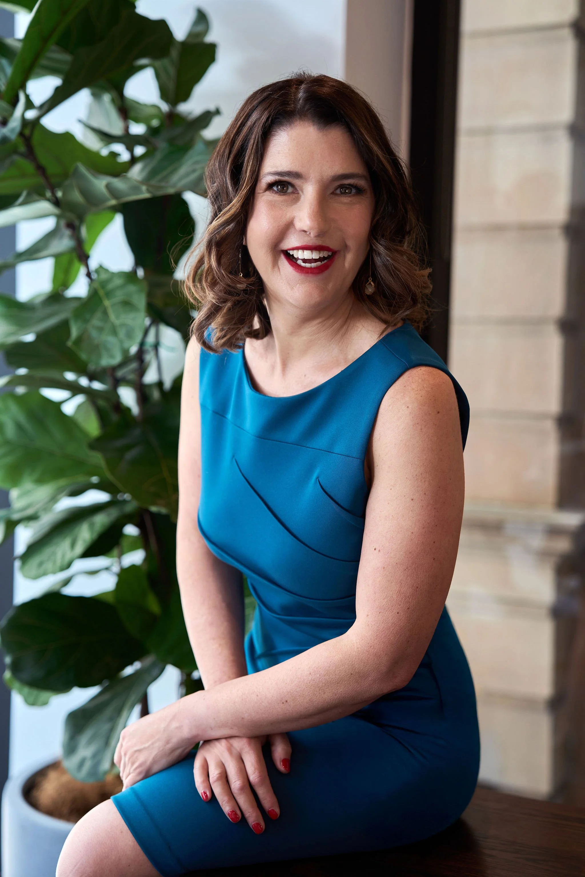 Sabine Lehner executive coach and hypnotherapist Sydney smiling in coaching session