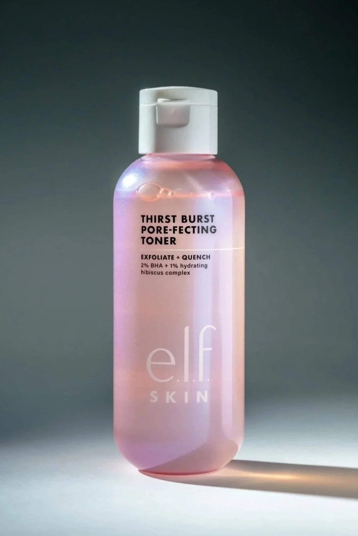 A pink bottle labeled 'Thirst Burst Pore-Perfecting Toner' with a white cap, set against a gradient background.