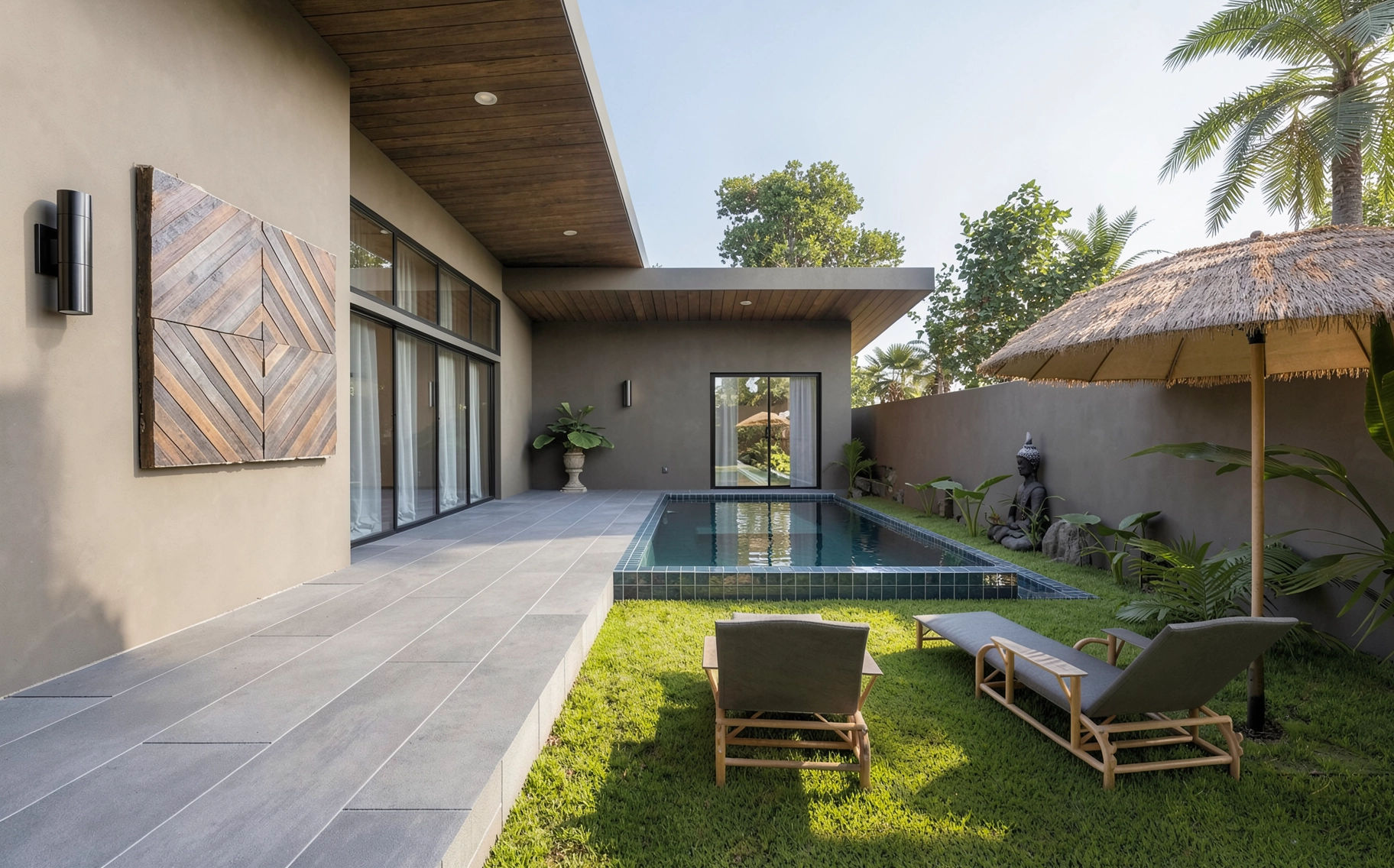 Modern backyard with a swimming pool, lounge chairs, parasol, garden plants, and tropical trees.