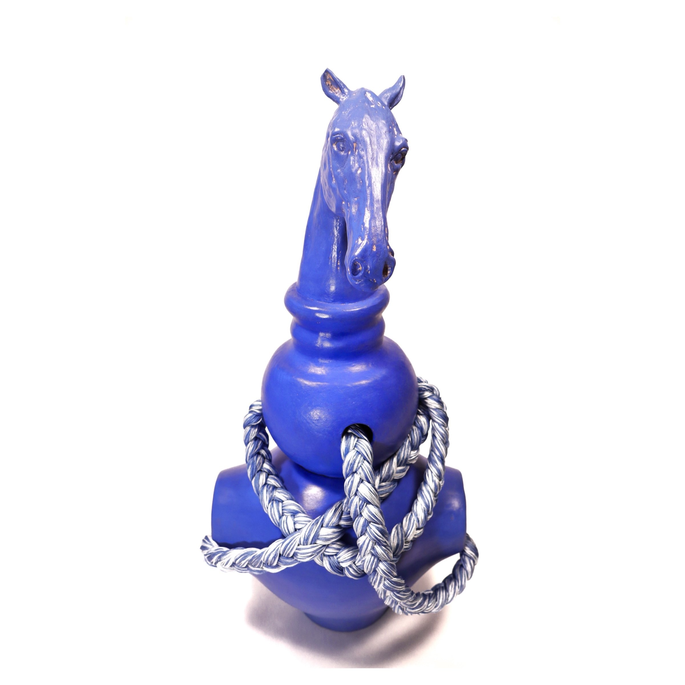 Front view of Blue Horse, contemporary terracotta sculpture finished with cobalt blue engobe and natural rope.