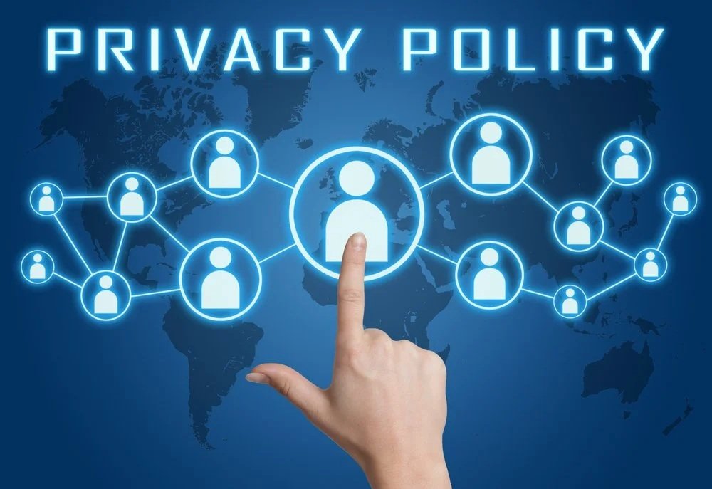 A digital graphic of a world map with interconnected user icons, with the words 'PRIVACY POLICY' at the top, and a hand pointing at one of the icons.