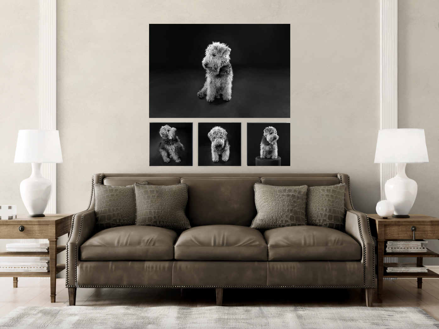 Living room with a brown couch, pillows, two side tables with white lamps, and wall art featuring four black-and-white photos of a fluffy dog.