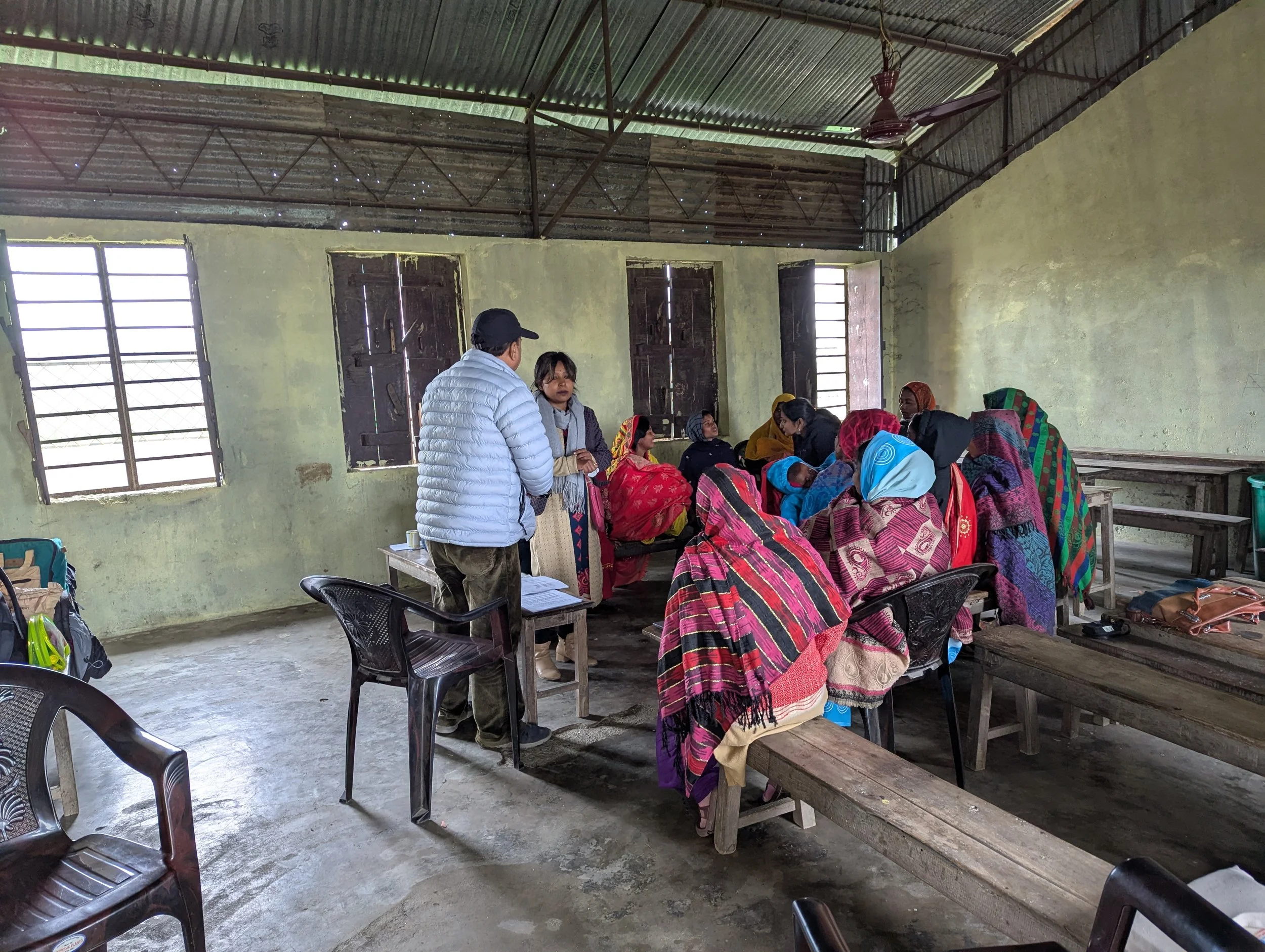 Research session with women participants in a village school in the Terai region of Nepal, part of participatory field research on gendered nutrition norms by Lagori Collective with USAID and Helen Keller International.