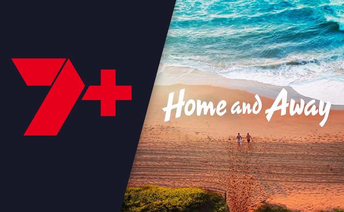 A logo with a large red number 7 plus symbol on a dark background, next to a photo of a beach with two people walking on the sand towards the ocean, overlaid with the words "Home and Away" in white script font.