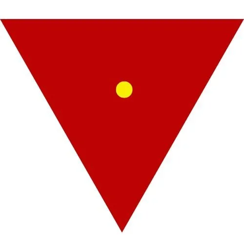 A red downward-pointing triangle with a small yellow circle in the center.