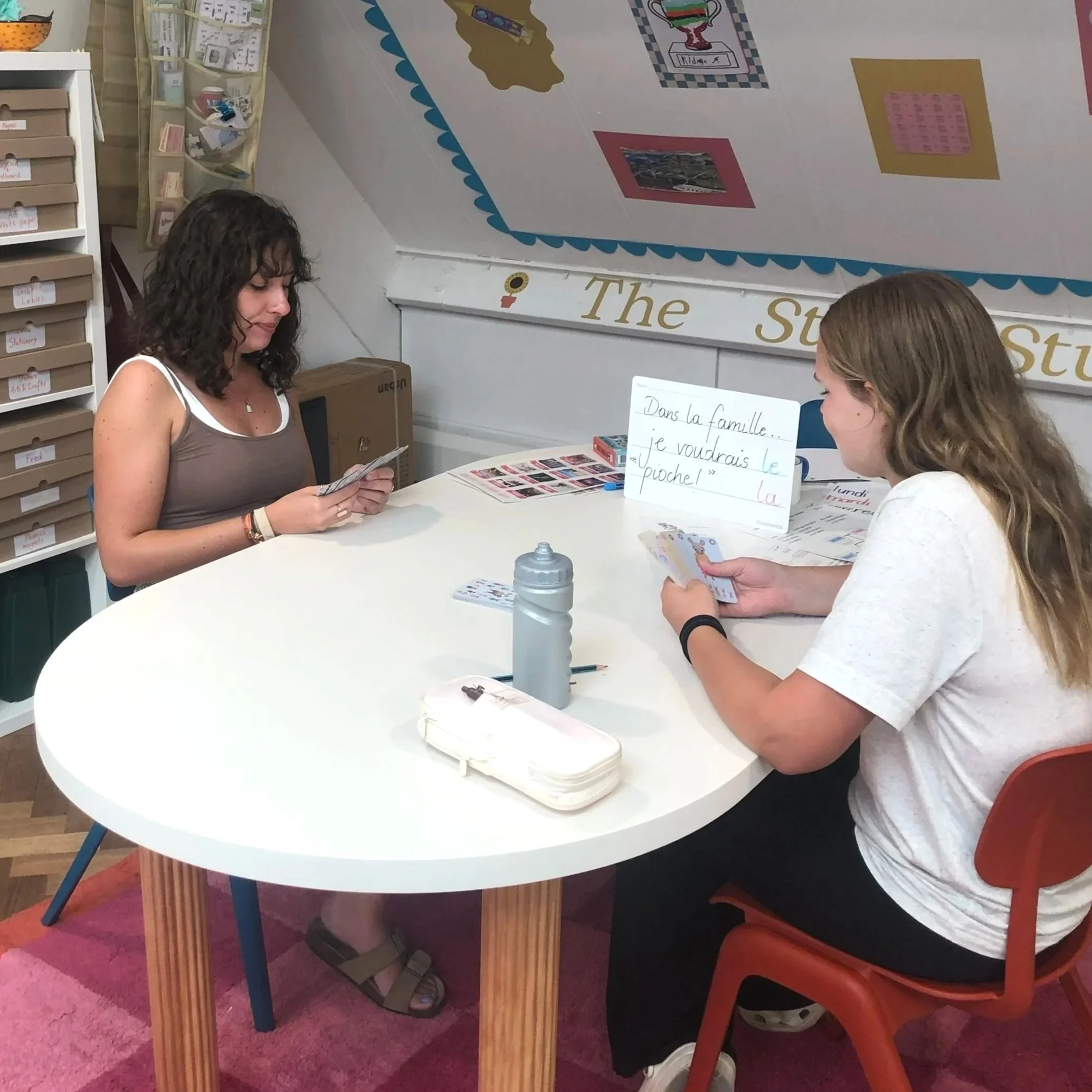 Teenager and tutor Laurine playing an interactive French language game at The Study Studio, Parsons Green Fulham