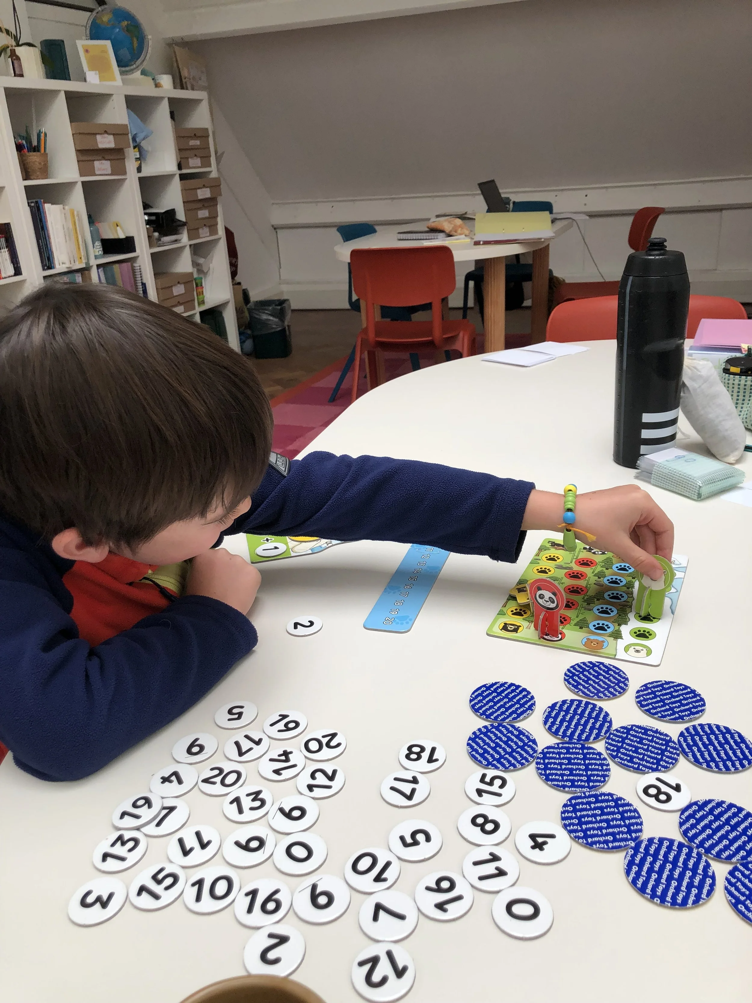 Young child playing an interactive maths game during a tutoring session at The Study Studio, Parsons Green Fulham