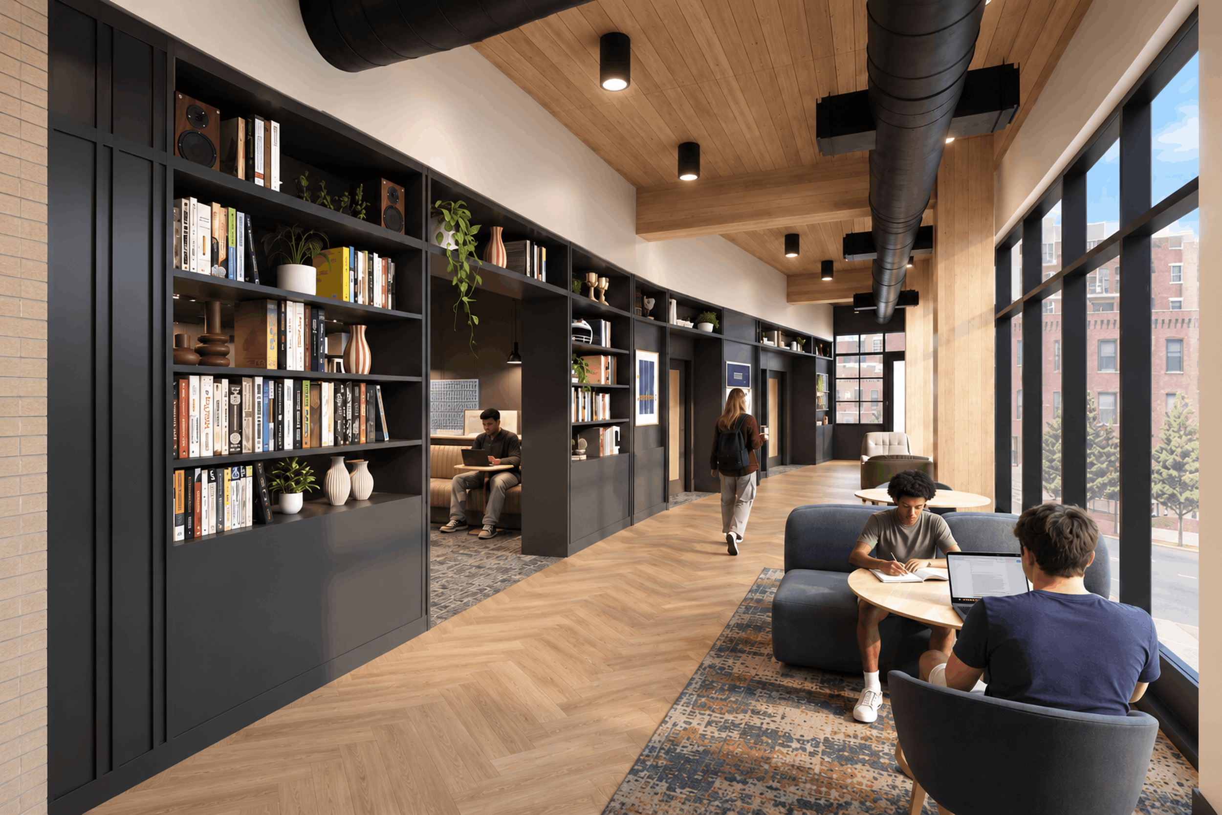 Modern lounge with large windows, wooden ceiling, black shelving filled with books and decorative items, people working and relaxing, and a variety of seating.