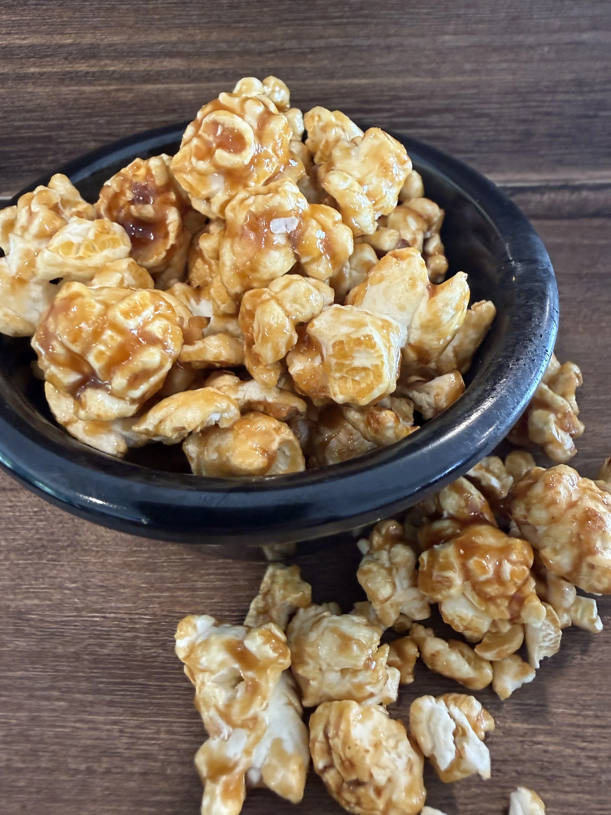 Caramel popcorn in a small bowl on display