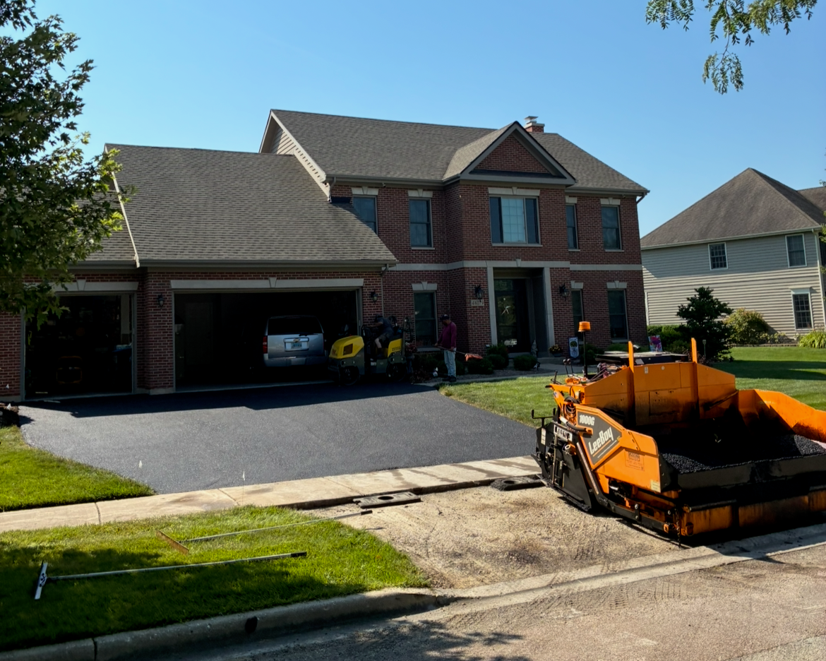 Asphalt driveway and parking lot paving in Elgin, IL for residential and commercial properties