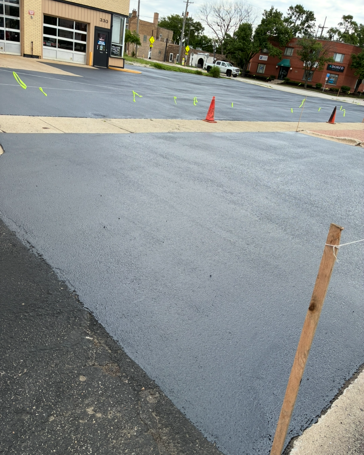 Asphalt sealcoating and crack filling in Elgin, IL for residential and commercial pavement maintenance