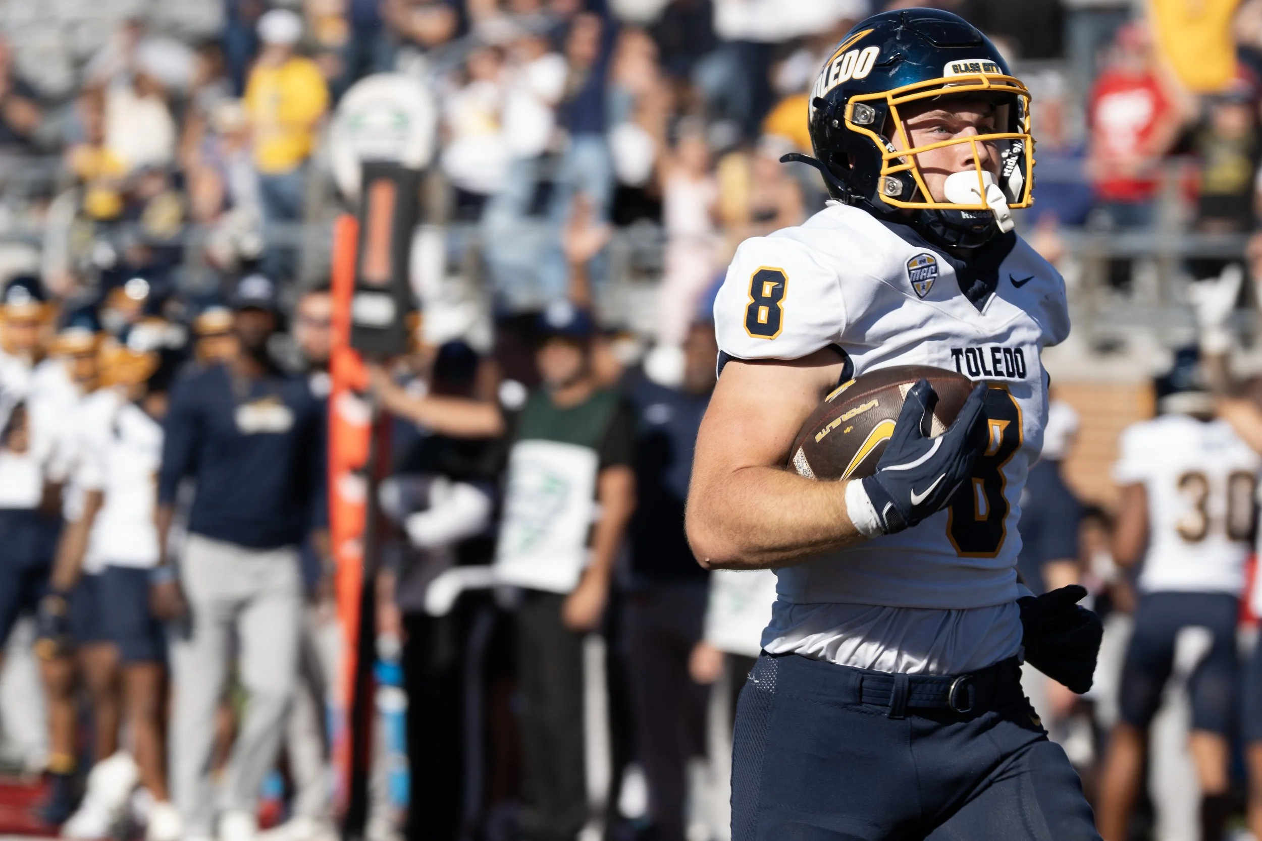 Toledo University Running Back Connor Walendzak runs into the end zone to score Oct. 3 in Muncie, Ind. Toledo won 39-24. 
