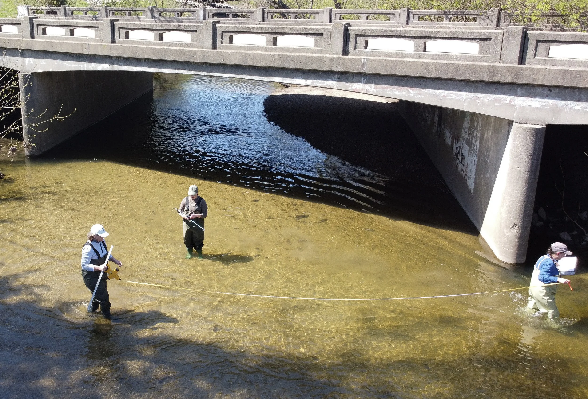 Rebecca , Theresa and Kelly set up to take water samples at Honey Creek on Sunday, March 29, in Martinsville, Ind.
