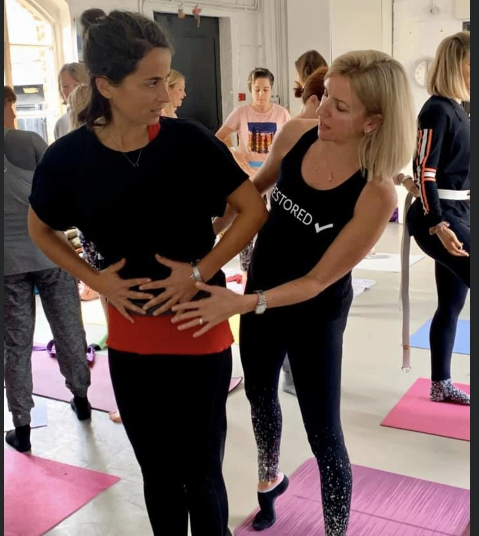 Louisa Thomas teaching during a CPD about core and pilates