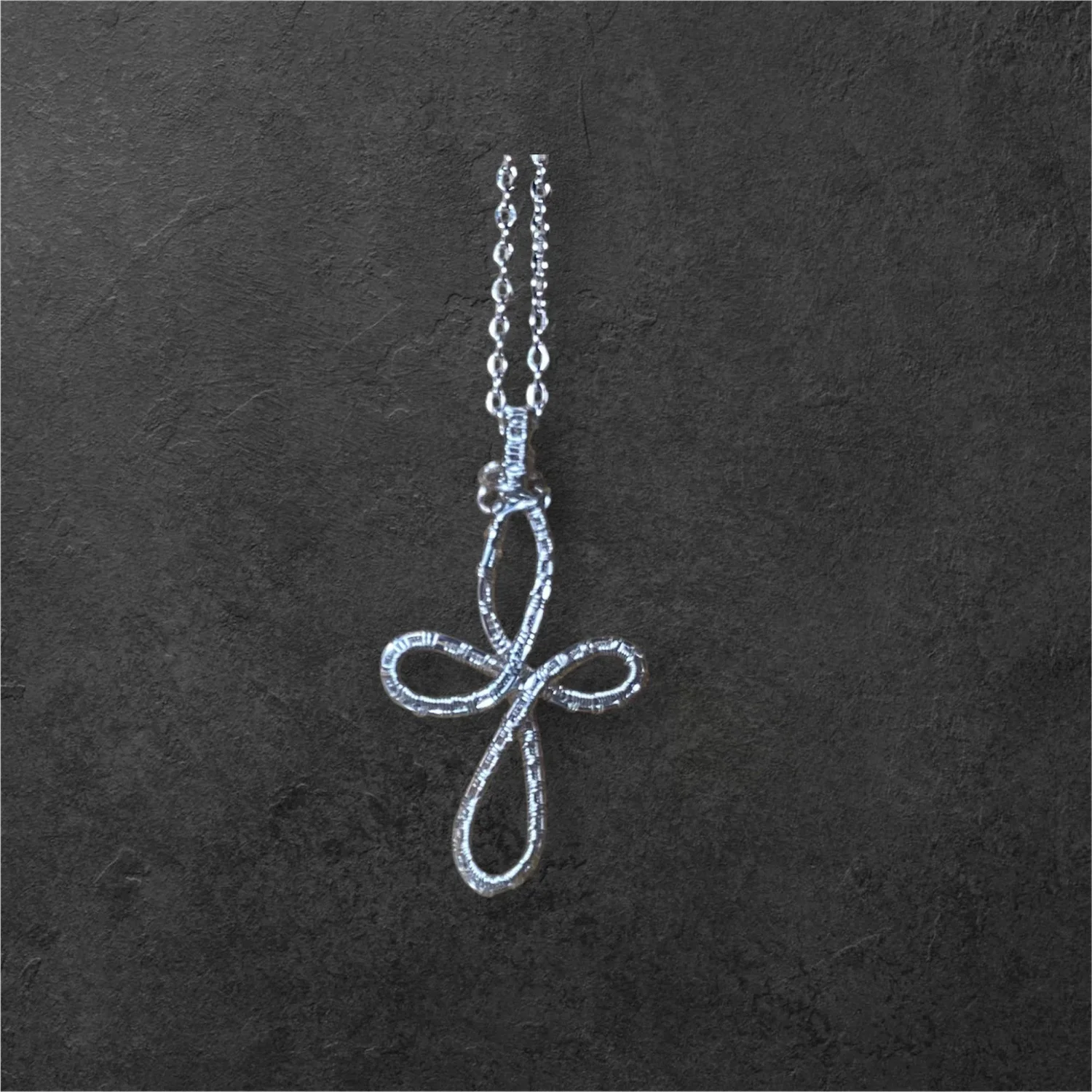 Sterling silver cross on a 16 inch chain