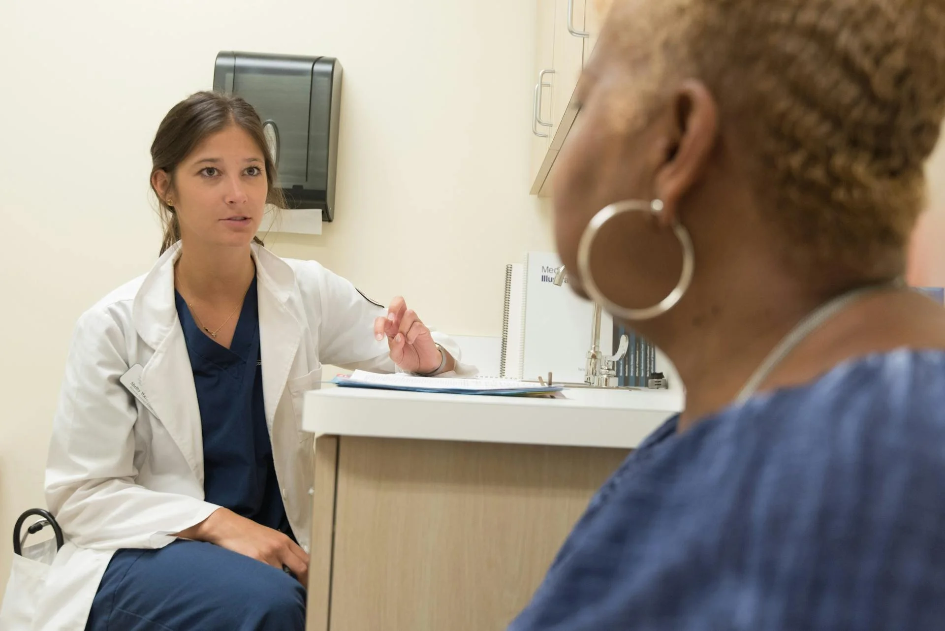 Doctor sharing news with her patient