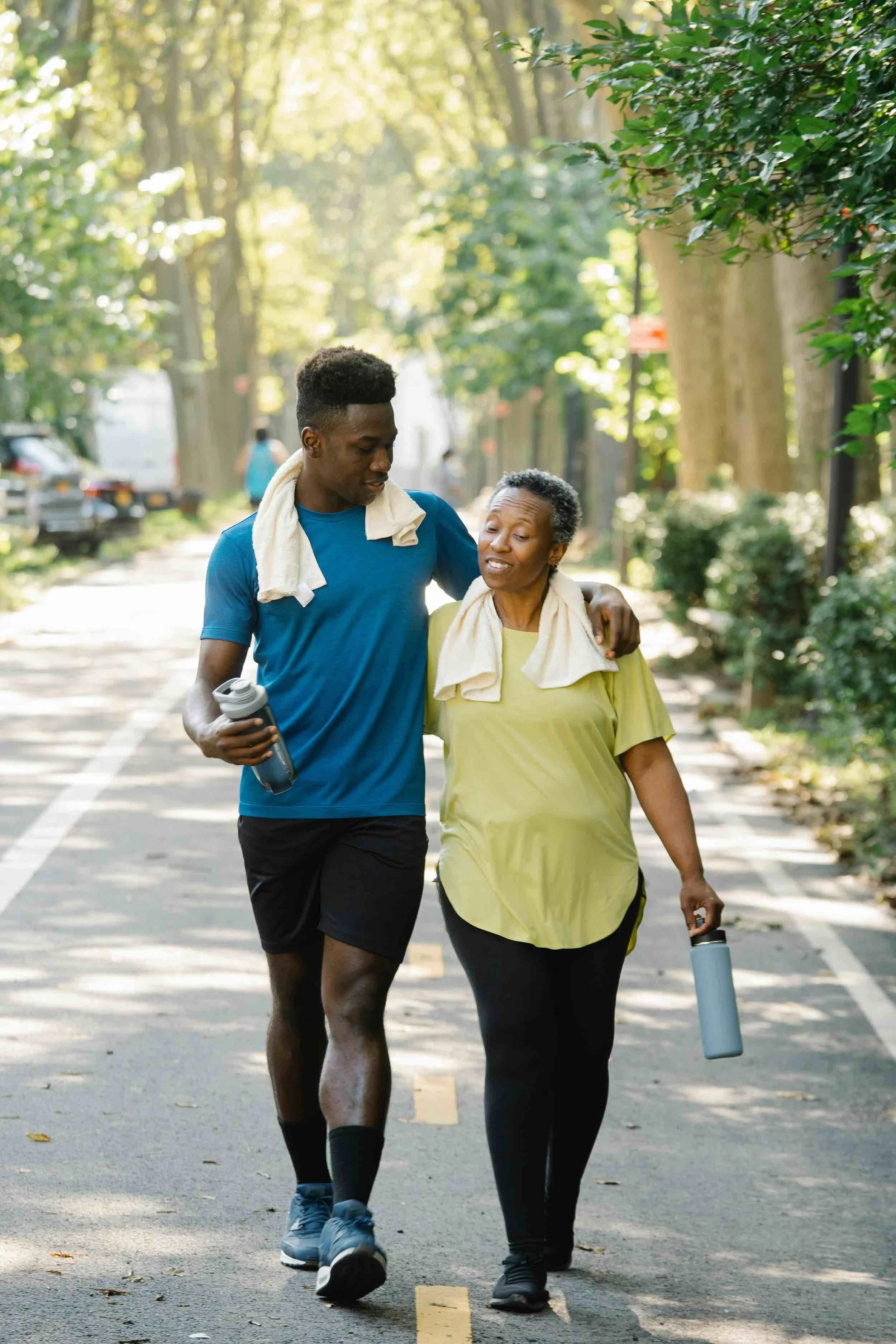Young man exercises with his mom