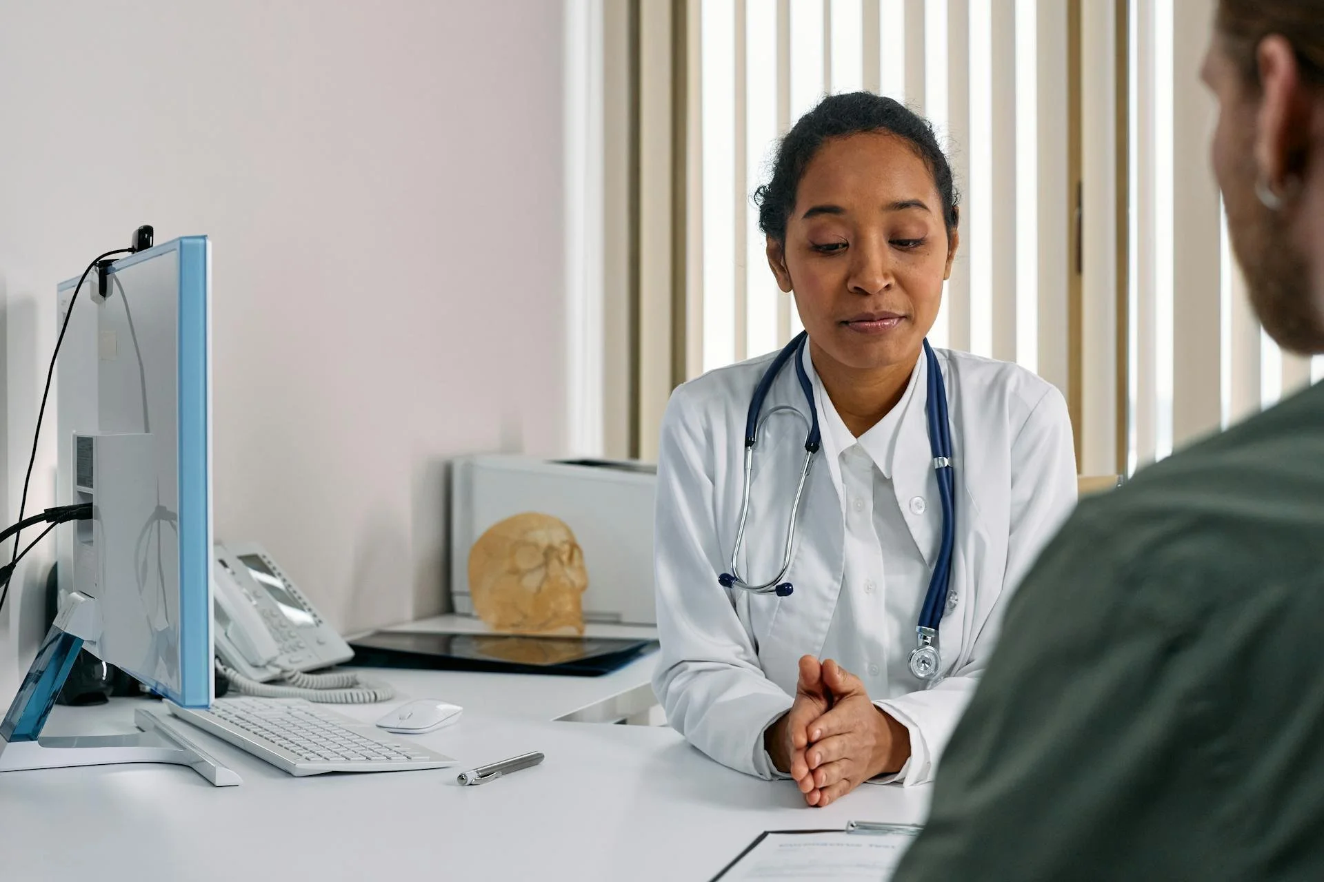 Doctor sharing news with her patient