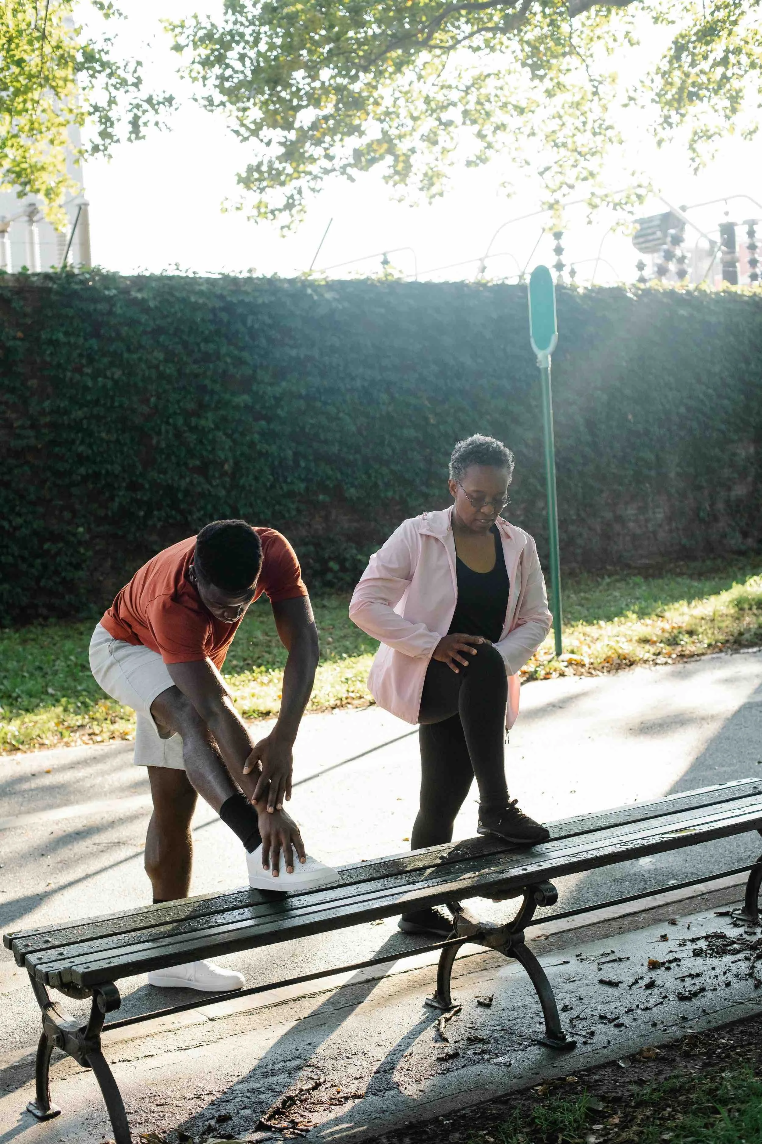 Young man exercises with his mom