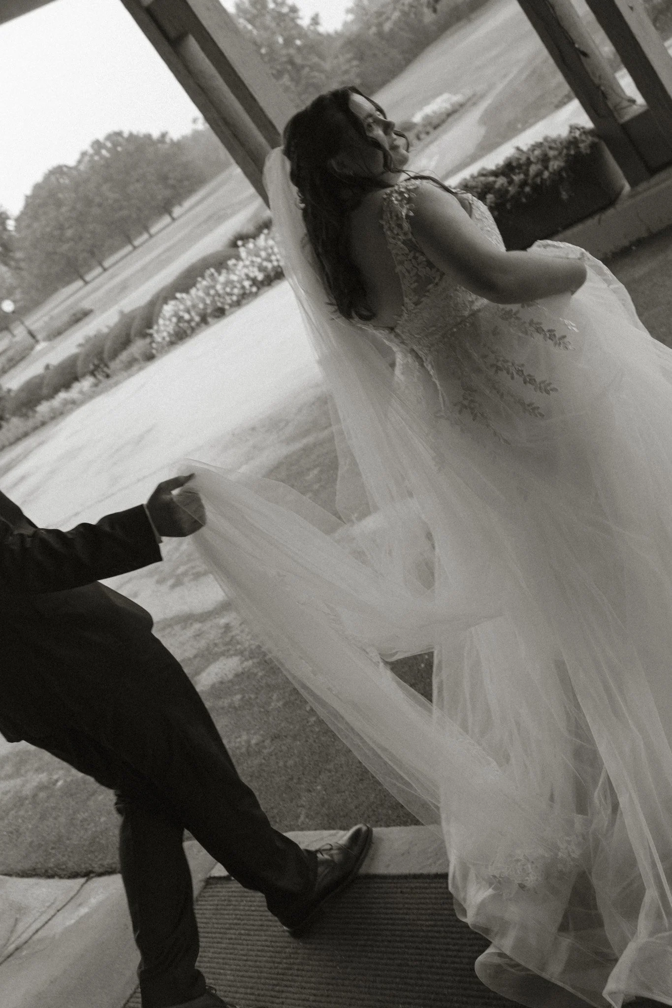 Rainy wedding day portrait by Chicago Catholic wedding photographer