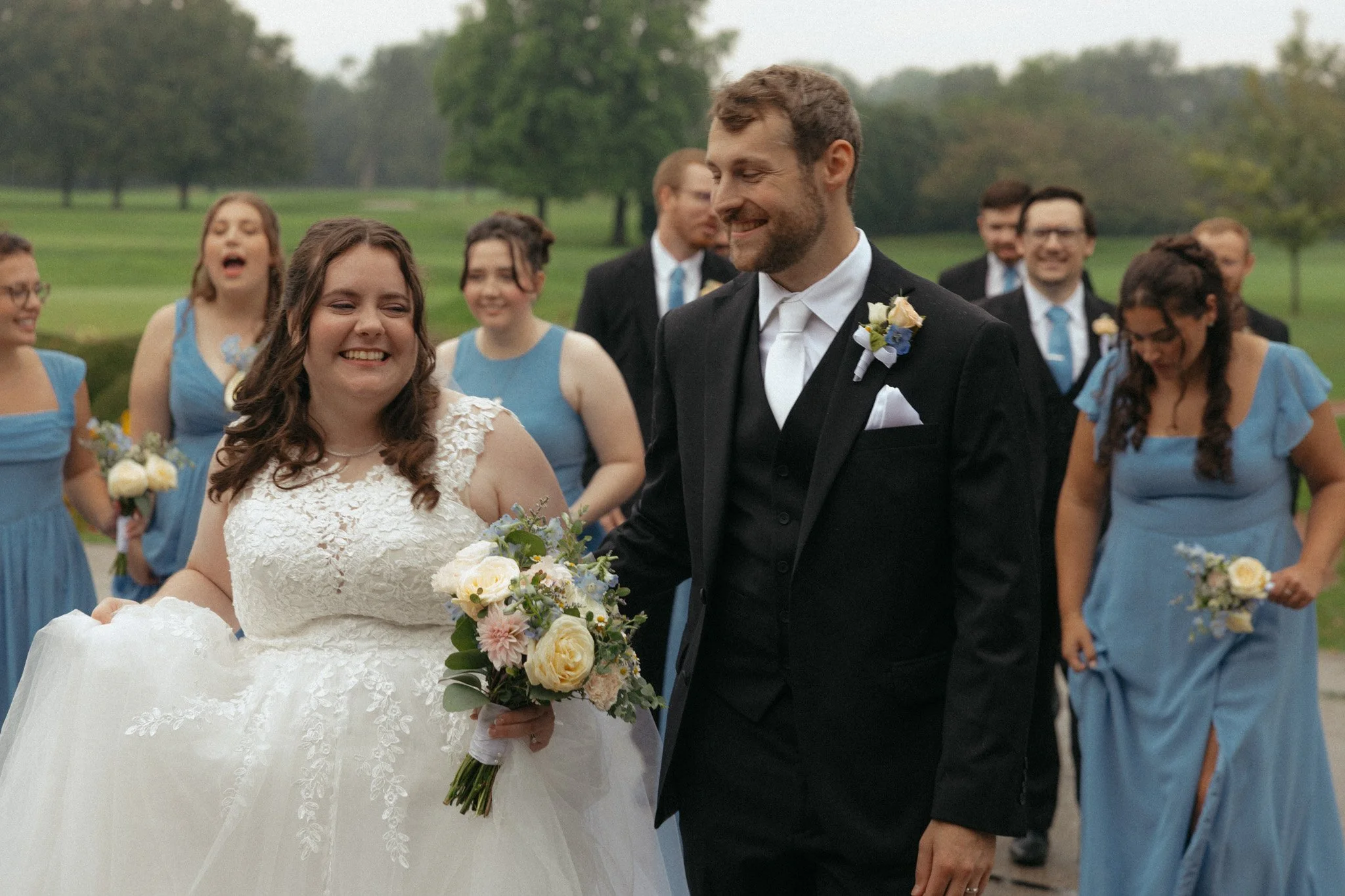Rainy wedding day portrait by Chicago Catholic wedding photographer