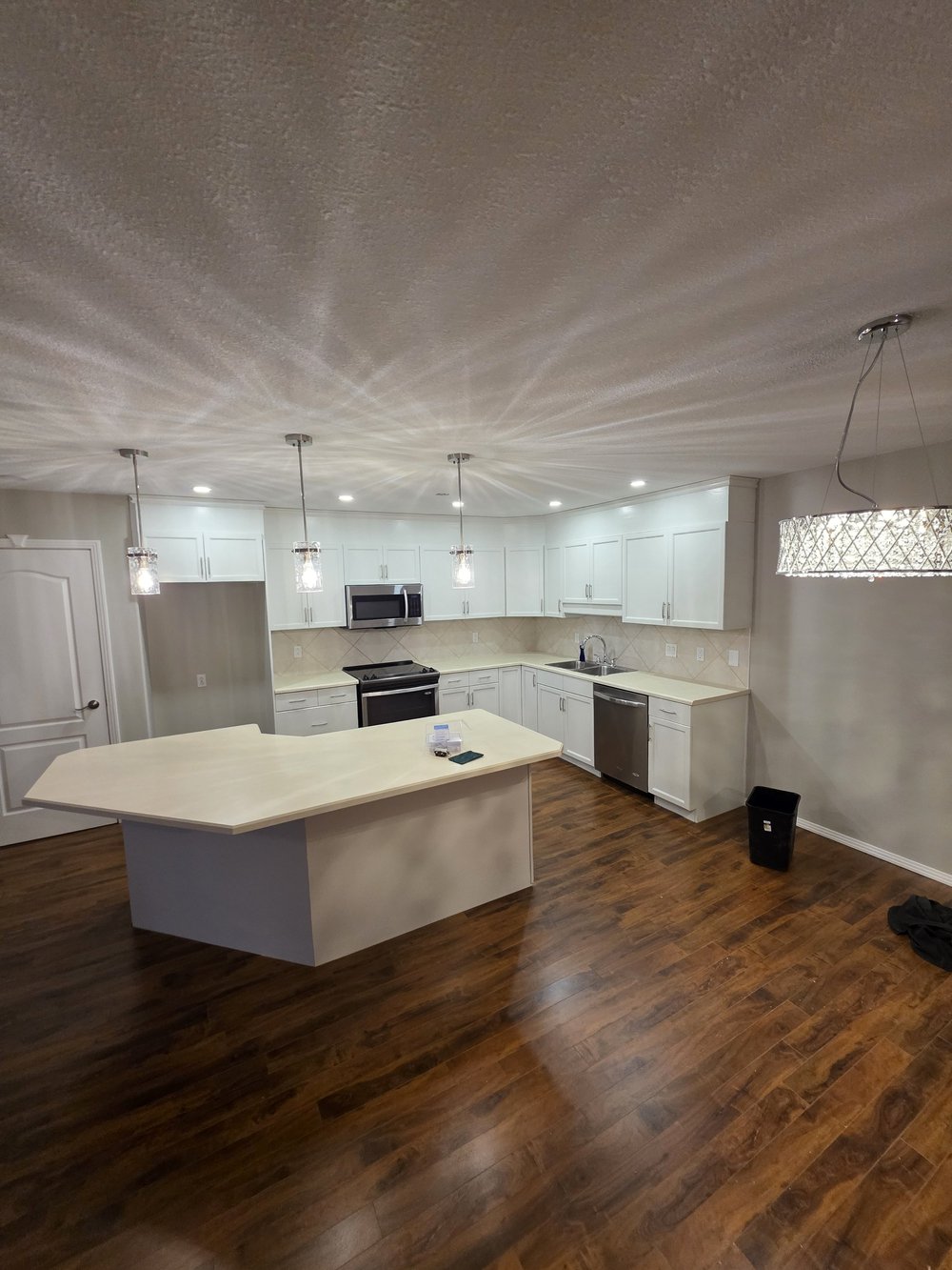 Kitchen island pot lights and pendant lights installed in Edmonton