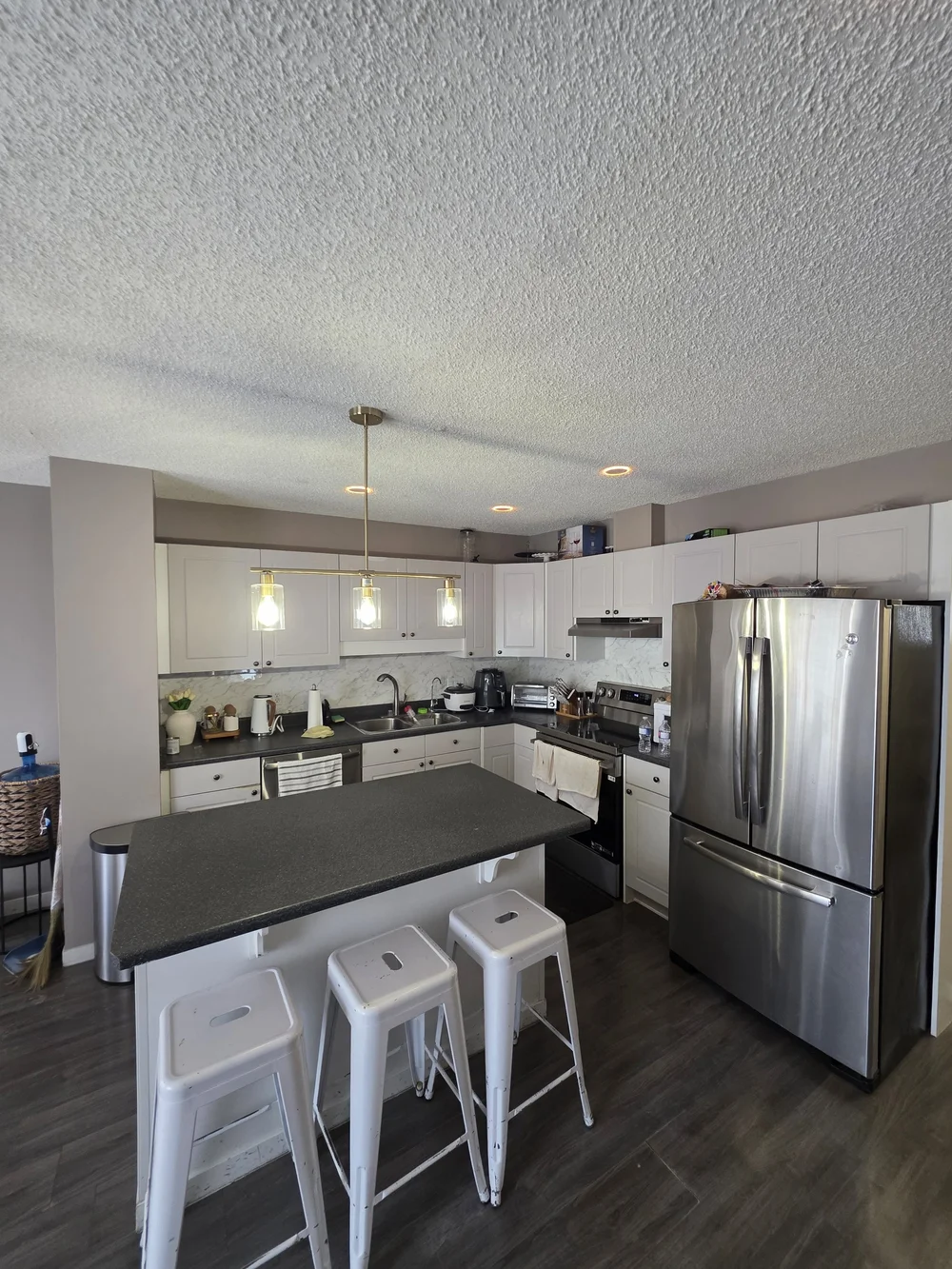 Kitchen island pot lights by Raylum Lighting