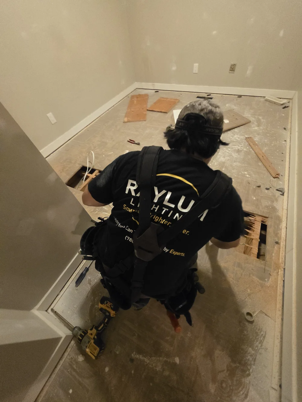 Raylum Lighting electrician installing lighting