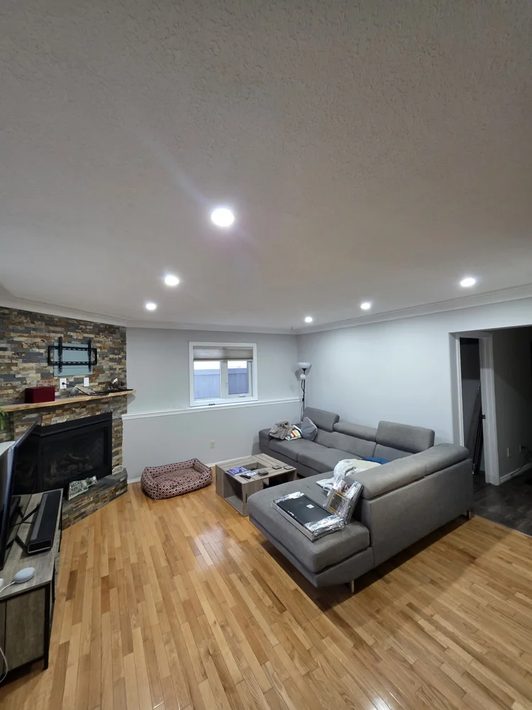Living room pot lights with hardwood floors Edmonton
