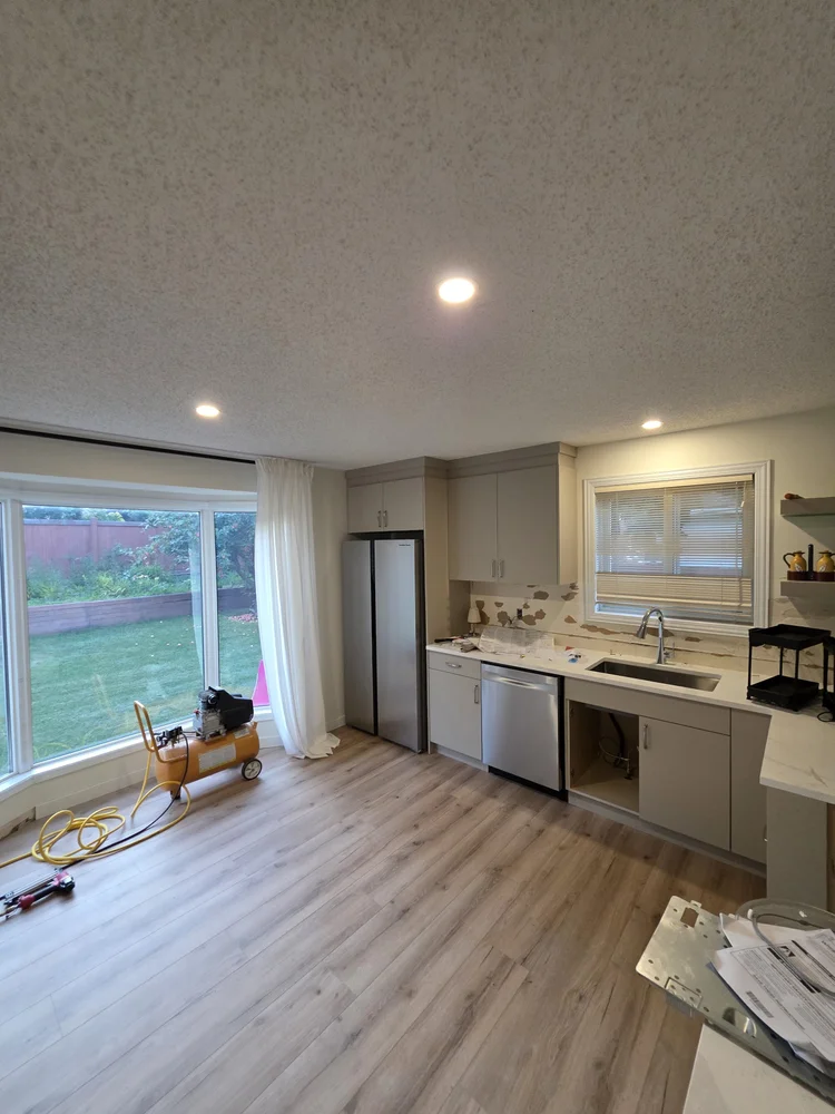 Open-concept kitchen pot lights Edmonton