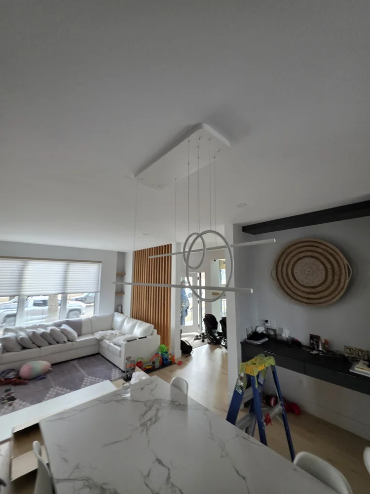 Modern linear pendant light fixture installation Edmonton