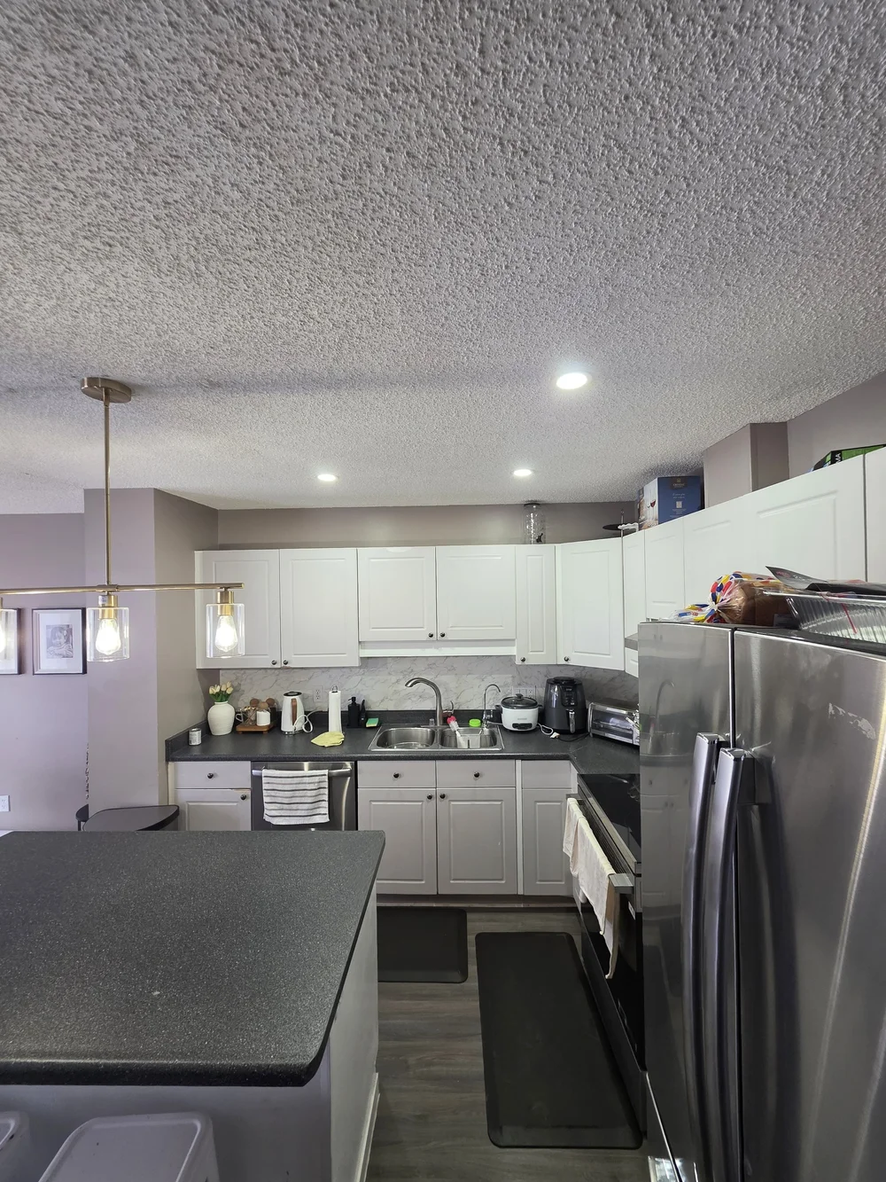 White kitchen pot lights by Raylum Lighting