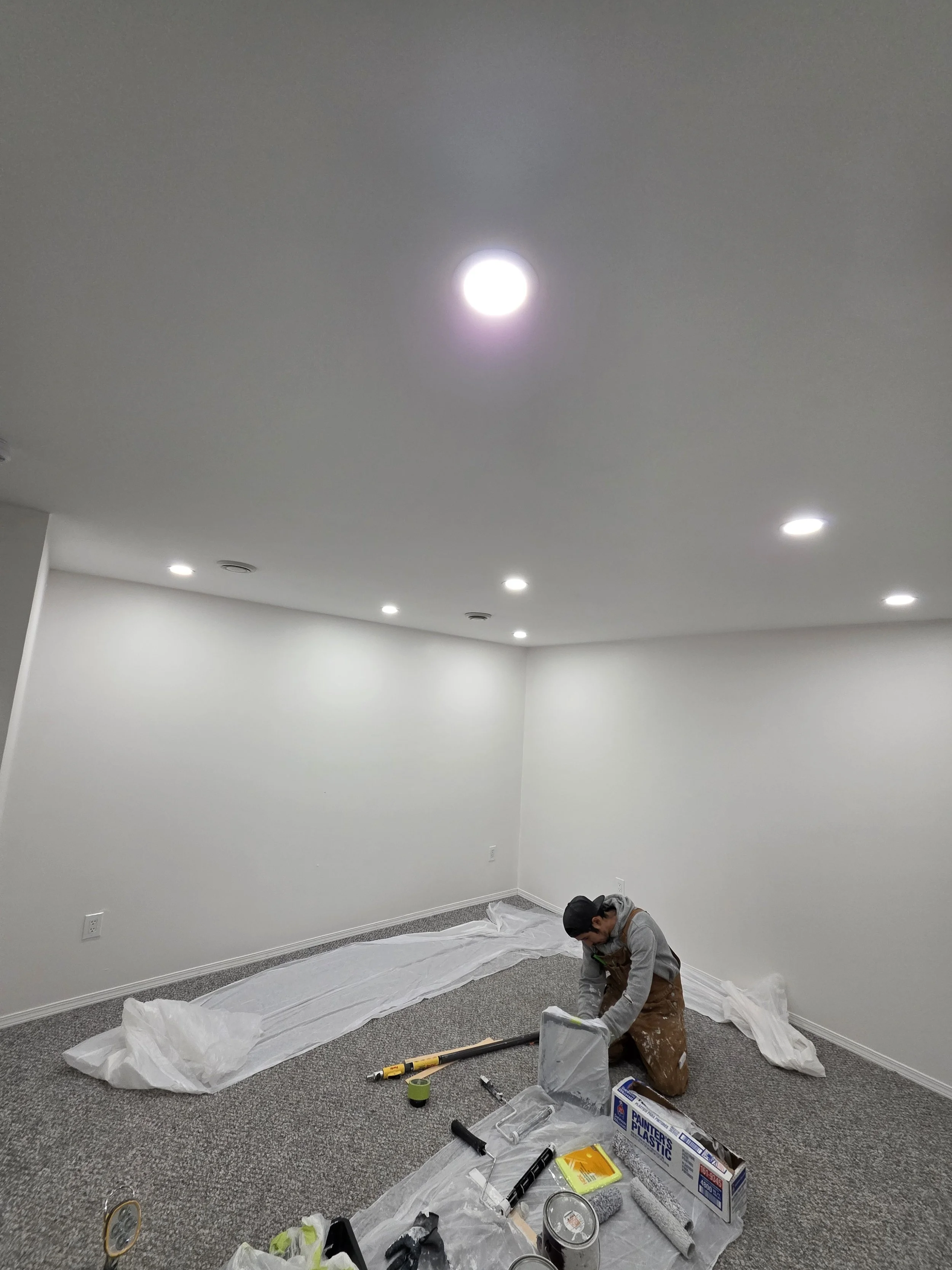 electrician-installing-pot-lights-edmonton.jpg