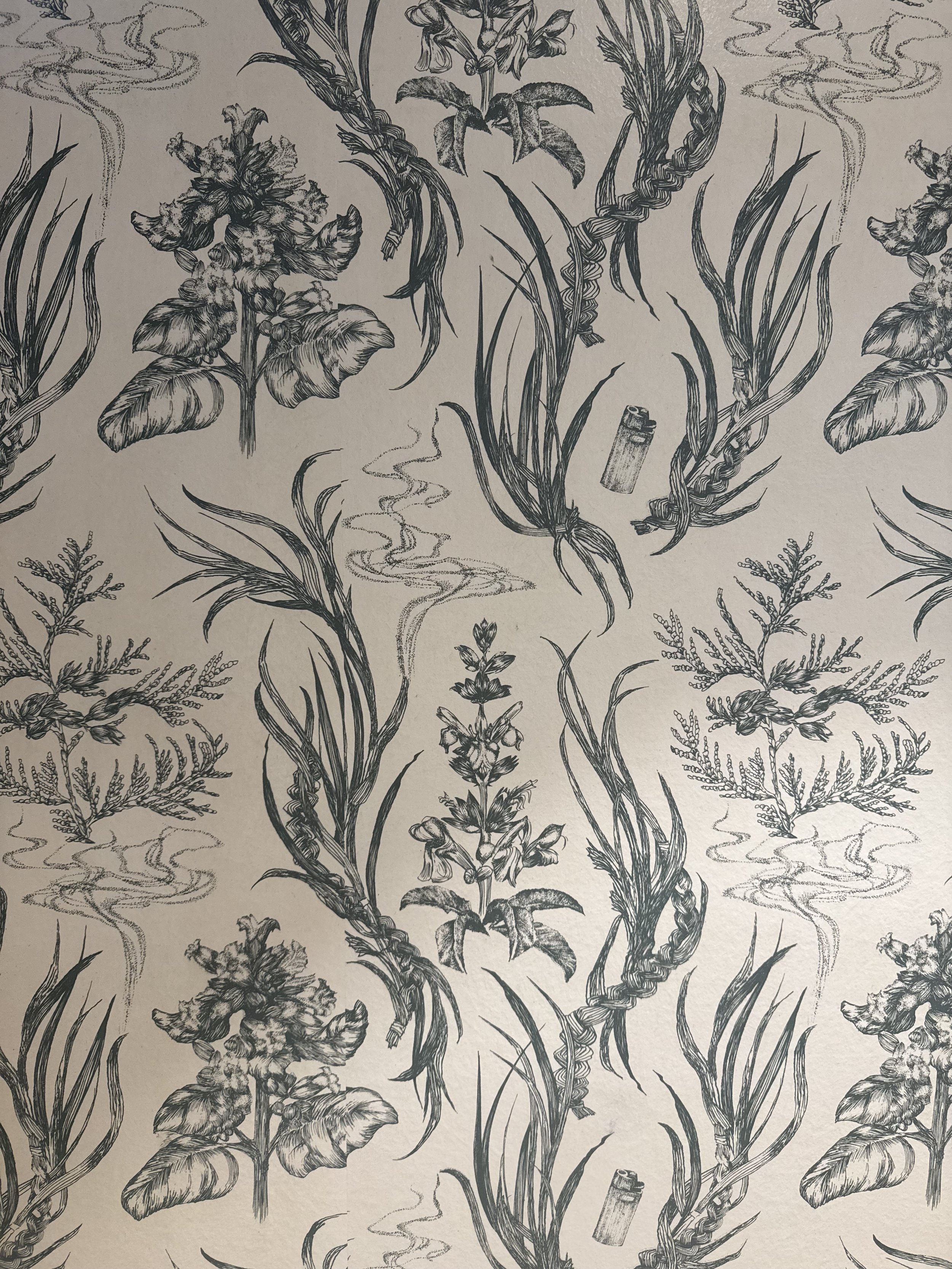 Black and white floral wallpaper pattern featuring various flowers, leaves, and swirling lines, including cigarette butts and smoke motifs.
