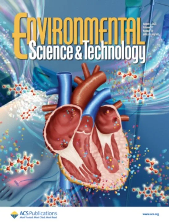 Cover of Environmental Science & Technology magazine featuring a colorful illustration of a human heart with scientific particles and molecular structures in the background.