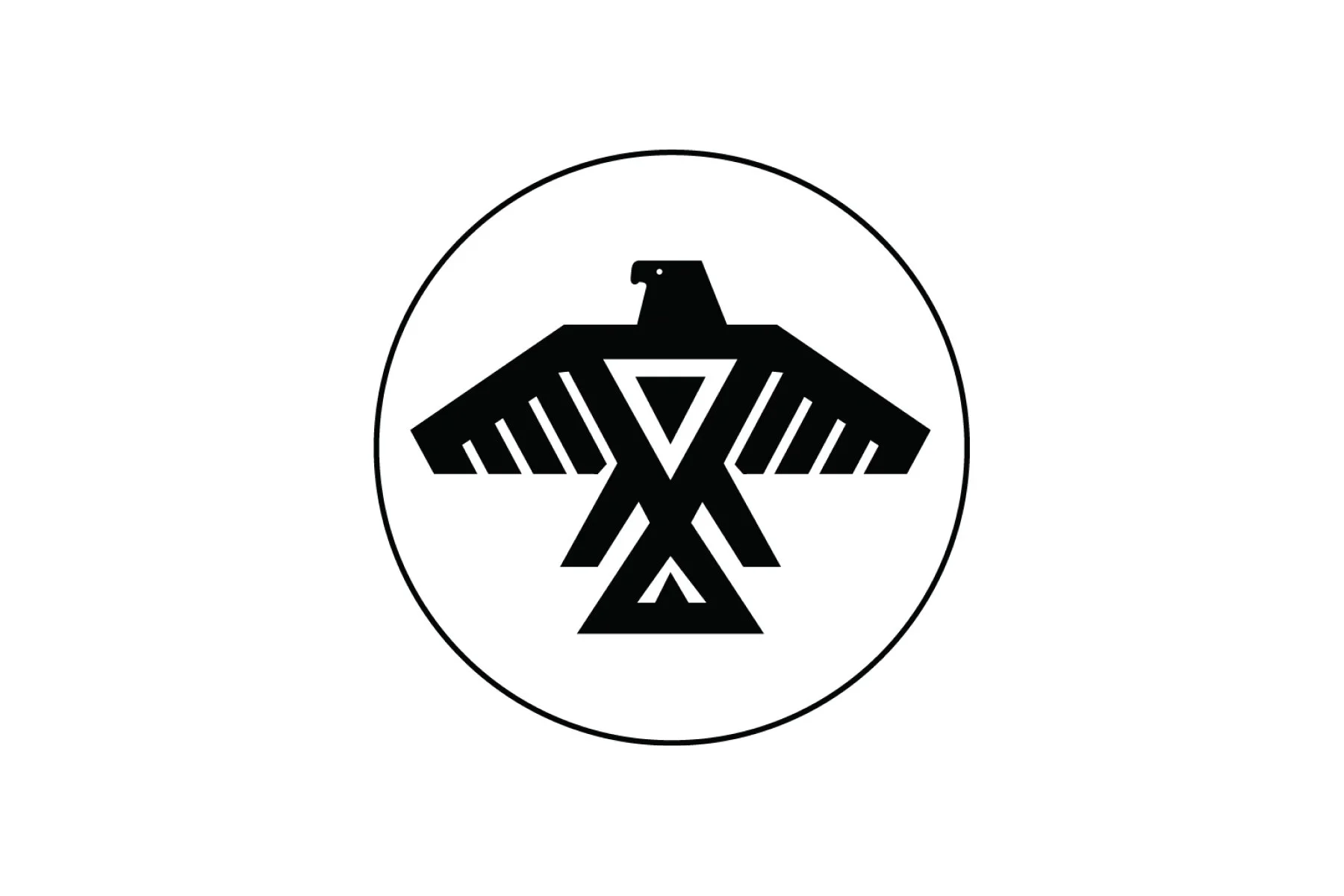 Black emblem of an eagle with outstretched wings inside a circle.