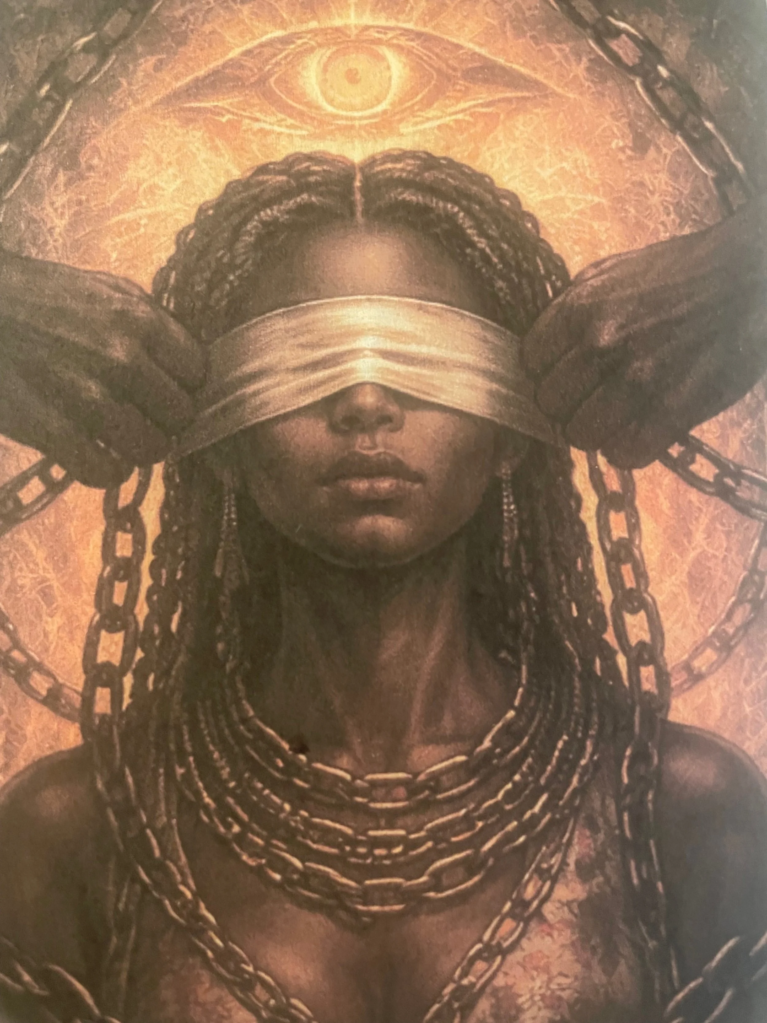 Silent Keeper: Bound Sight is a symbolic fine art piece exploring silence, endurance, restraint, and inner knowing.

Centered around a blindfolded figure wrapped in chains beneath an all-seeing eye, this work reflects the tension between what is outw