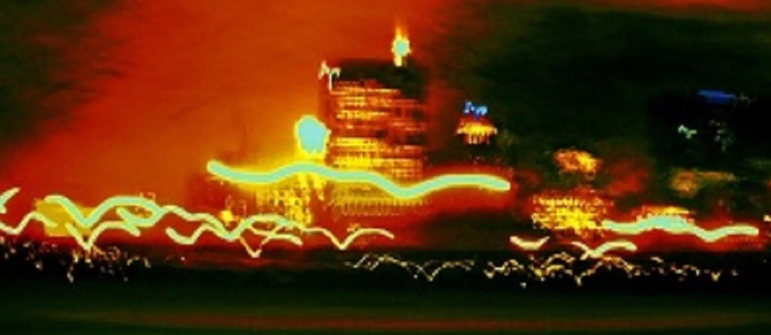 Light trails and illuminated buildings at night, creating a blurred cityscape.