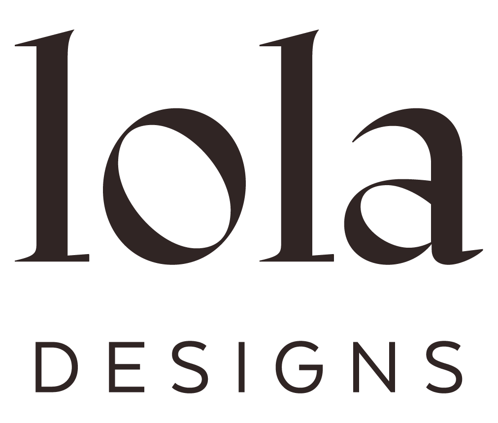 Company logo with the text 'lola DESIGNS' in black font on a white background
