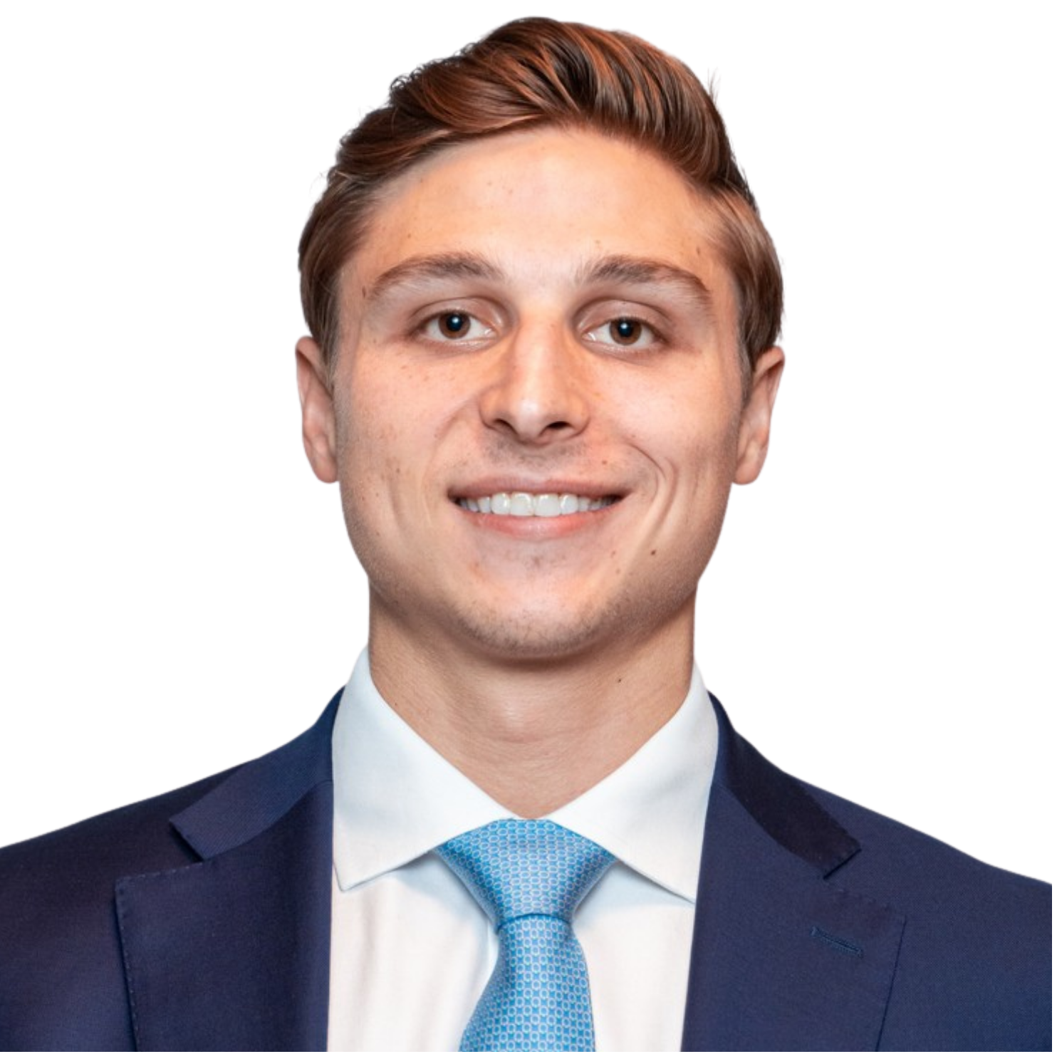 Black and white photo of a young man in a suit and tie, smiling, with a red halo around his head and some colored abstract shapes in the background.