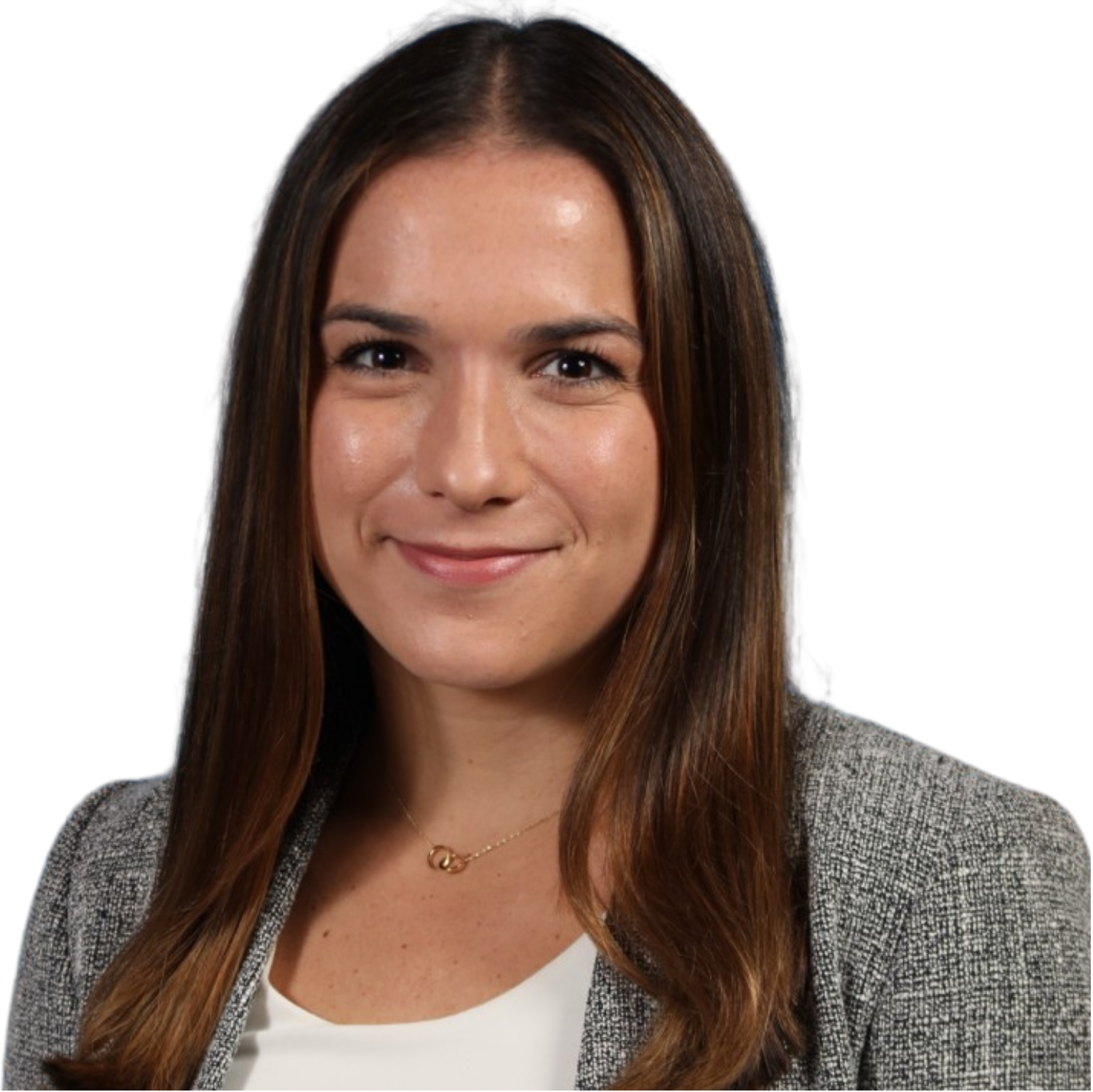 Black and white portrait of a smiling woman with long, straight hair, wearing a blazer and a necklace.
