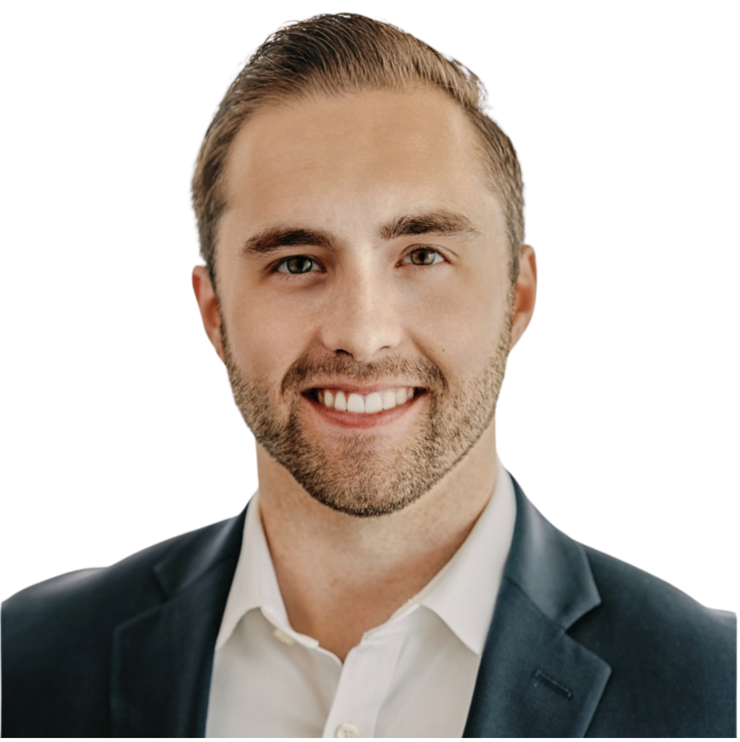 Black and white professional headshot of a smiling man with short, styled hair and a beard, wearing a dark blazer and a white shirt, in front of a blue loopy graphic background.
