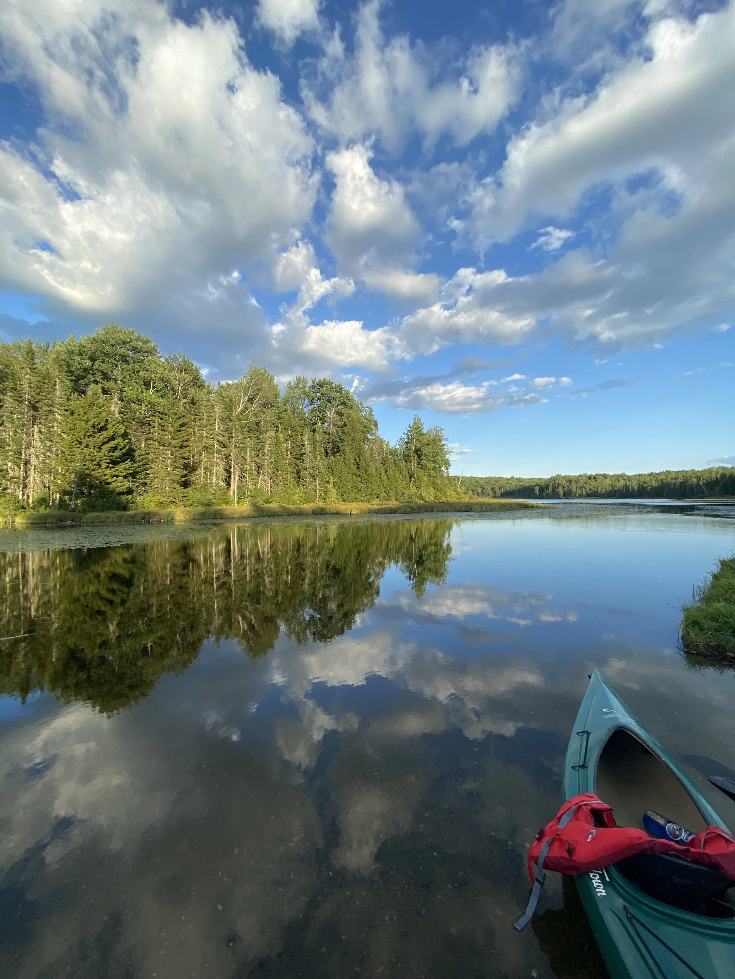 Between sky and reflection.