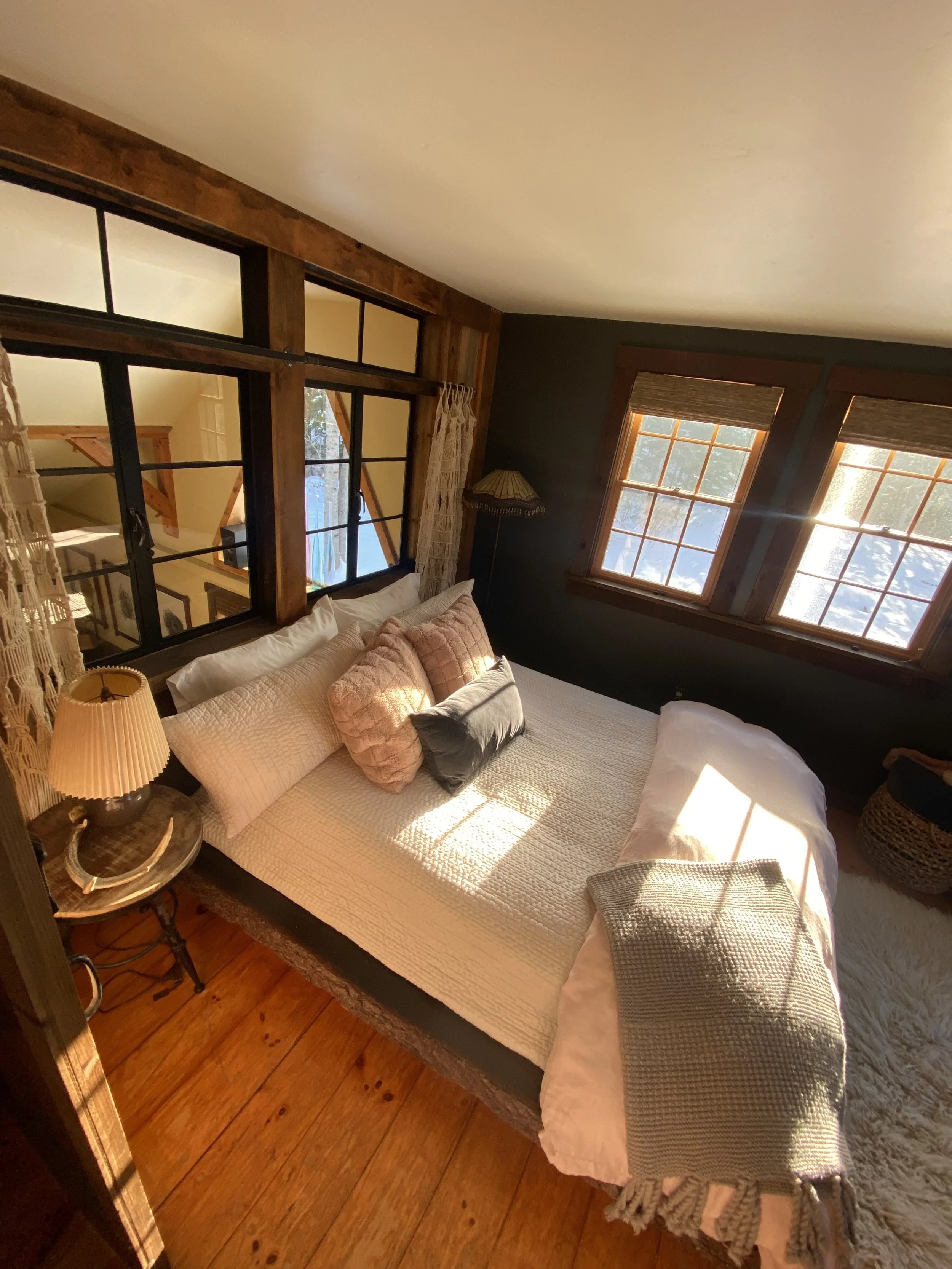 Vintage panes framing a view into the heart of the cabin.