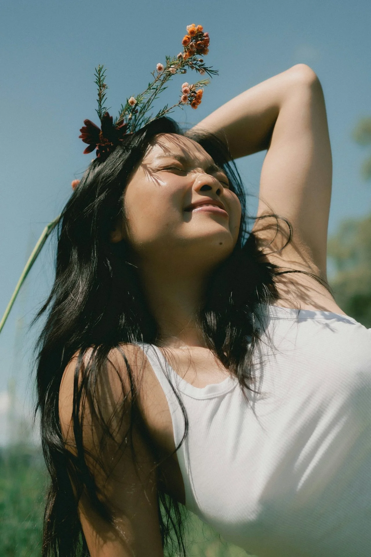 Smooth skin after electrolysis hair removal shown in natural outdoor setting