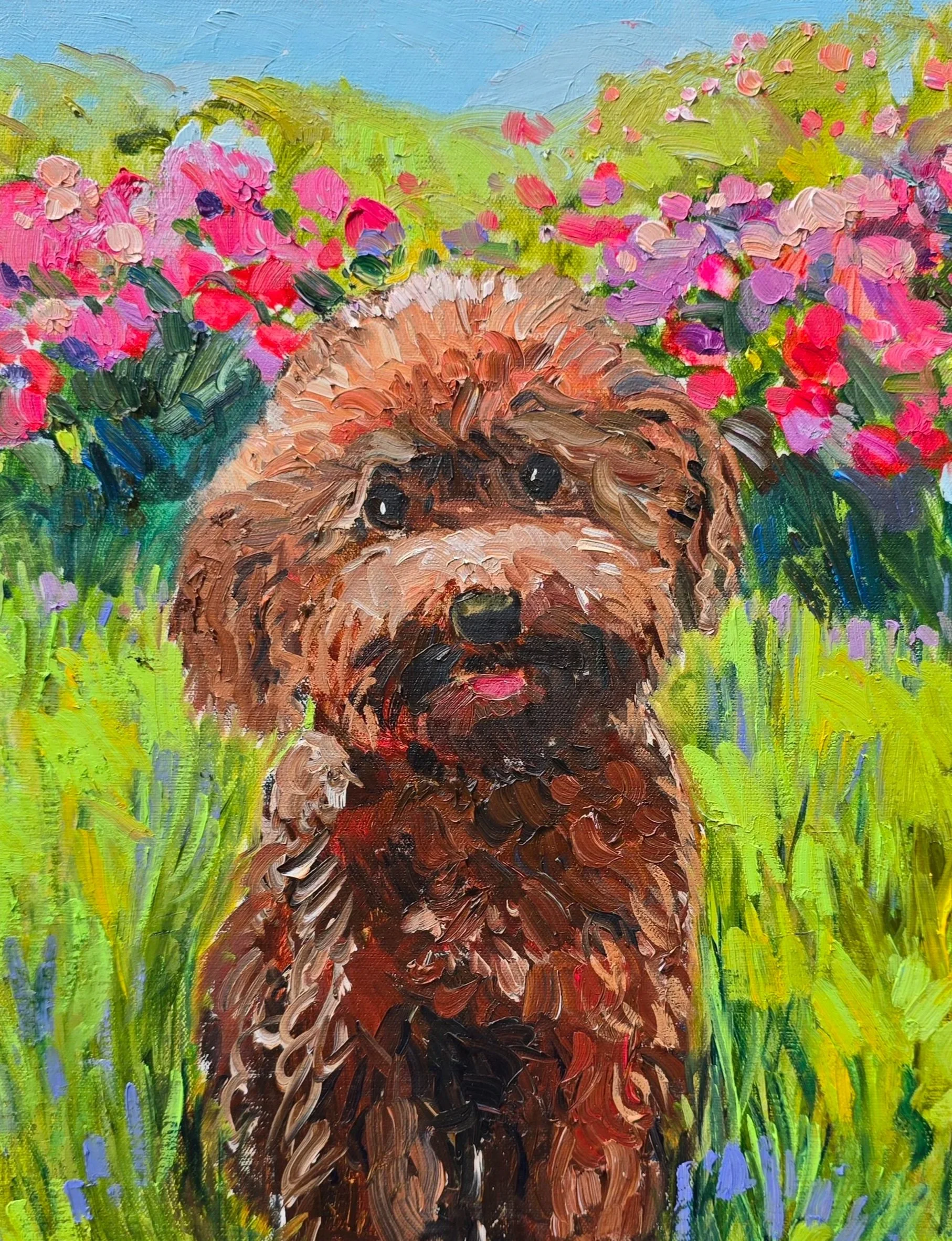A colorful oil painting of a small dog with long brown fur, a black nose, and expressive eyes, sitting in a field of green grass surrounded by pink and purple flowers under a blue sky.