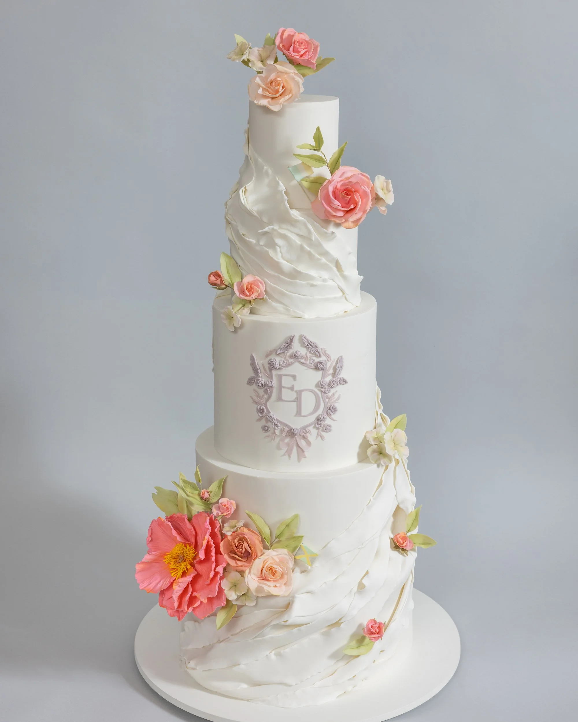 Five Tier White Wedding Cake with Peach and Pink Sugar Flowers